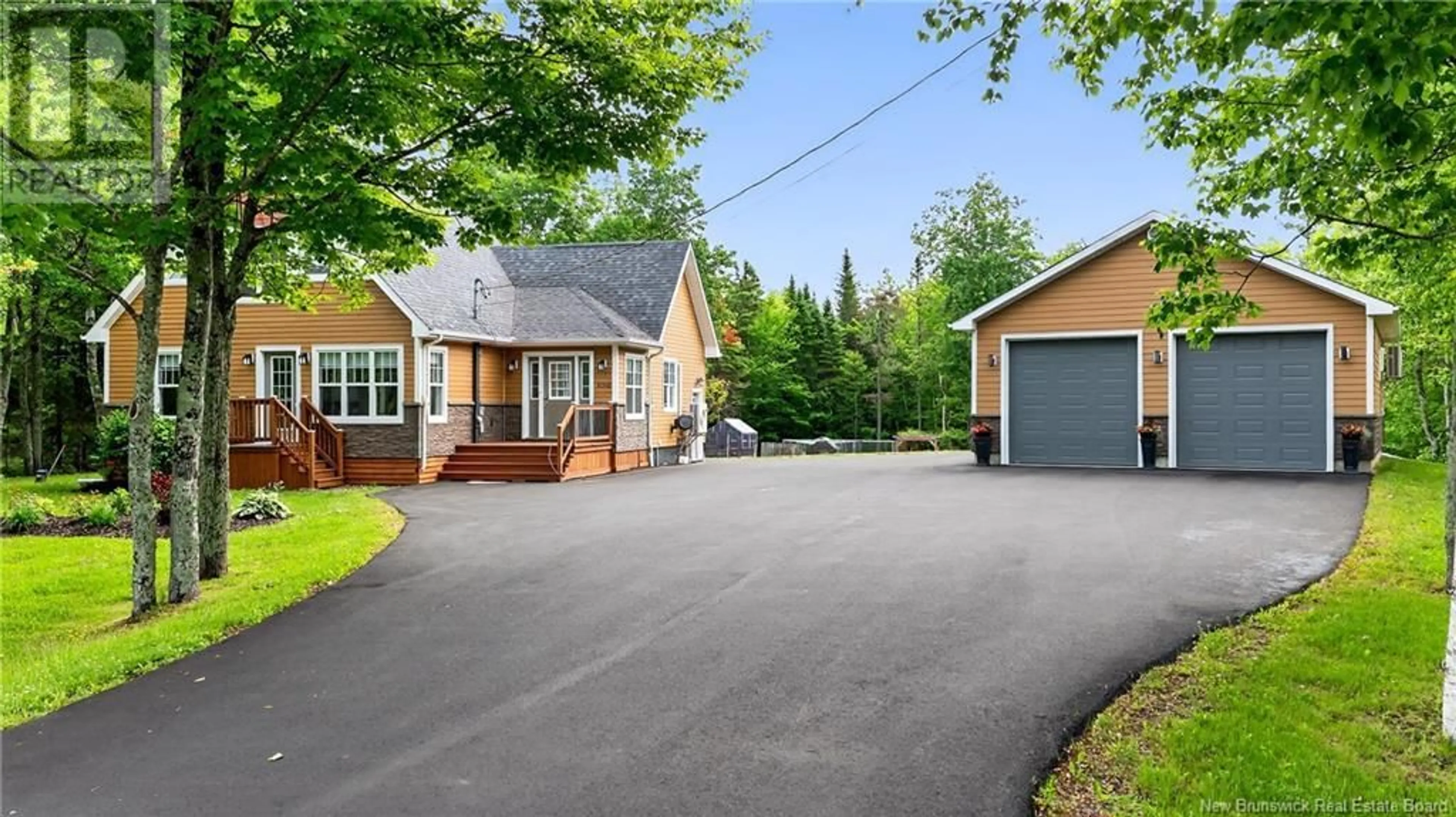 A pic from outside/outdoor area/front of a property/back of a property/a pic from drone, street for 1062 ROUTE 135, Duguayville New Brunswick E8M1K2