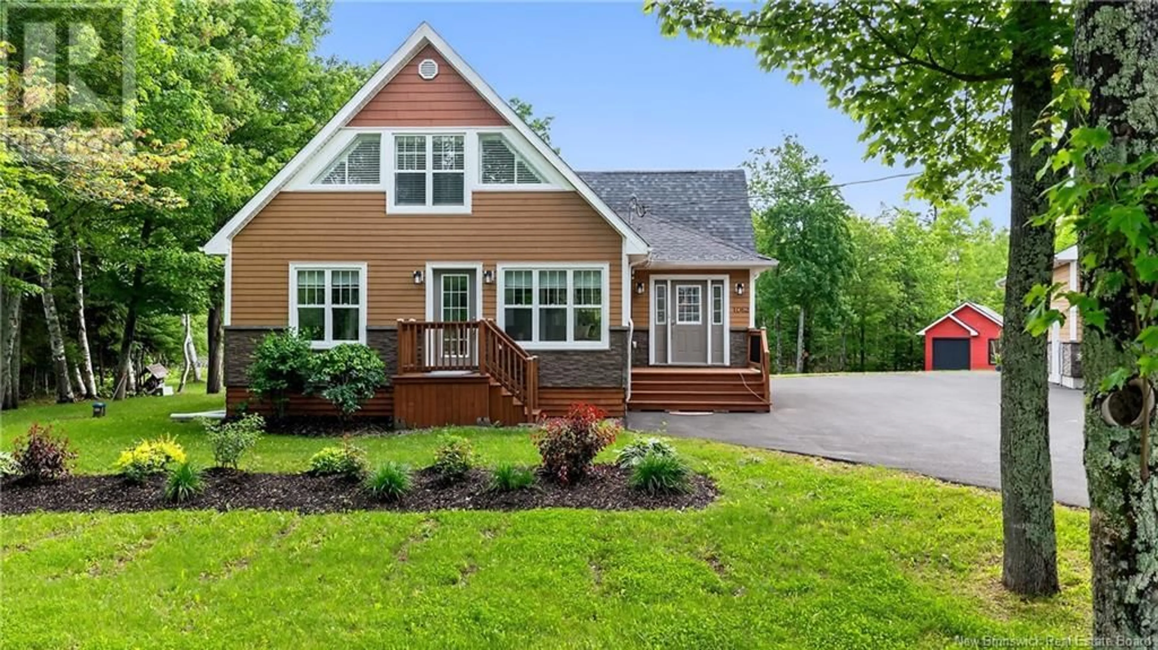 Home with vinyl exterior material, street for 1062 ROUTE 135, Duguayville New Brunswick E8M1K2
