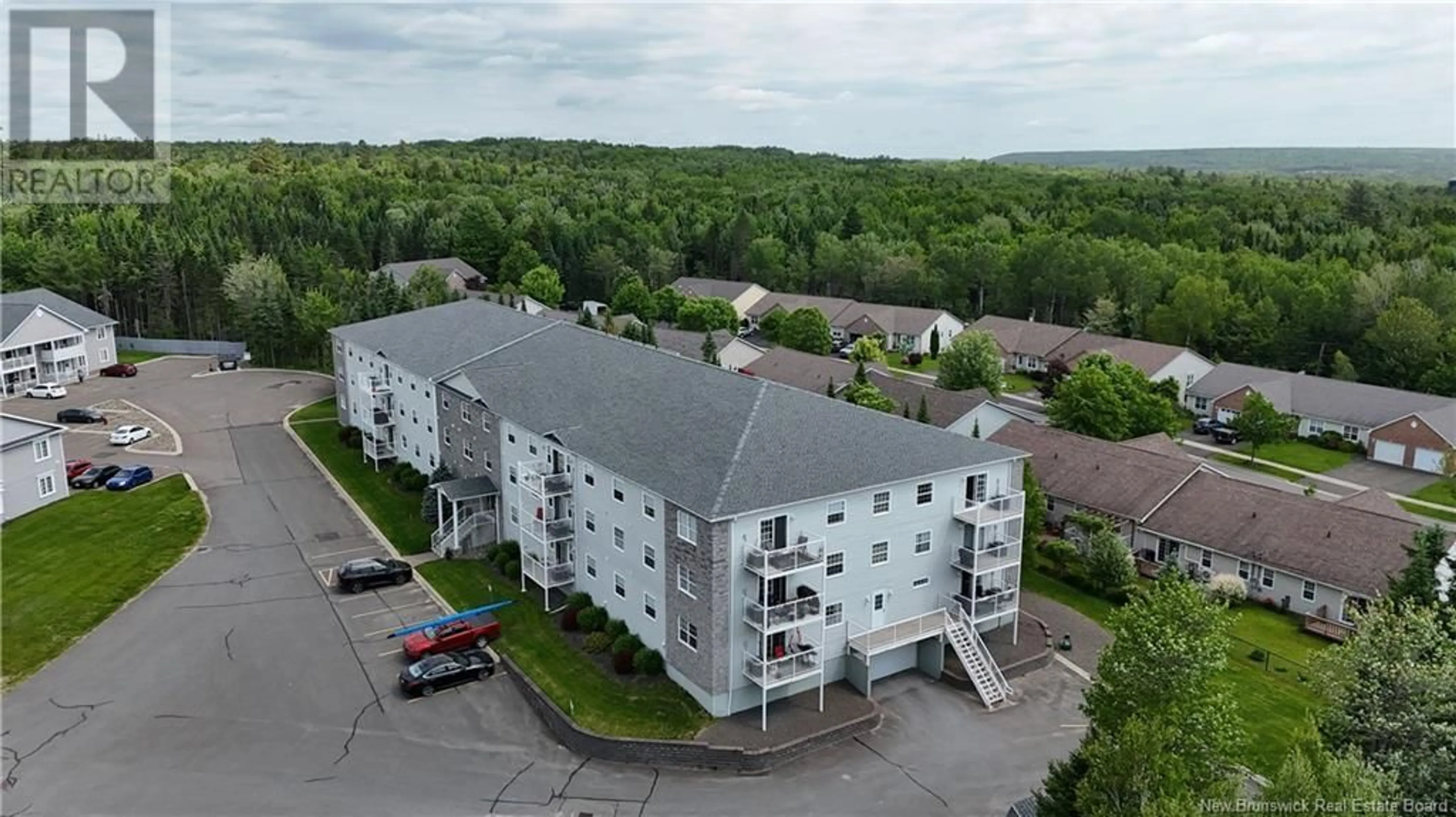 A pic from outside/outdoor area/front of a property/back of a property/a pic from drone, building for 301 - 40 BROWN BOULEVARD, Fredericton New Brunswick E3A0L7