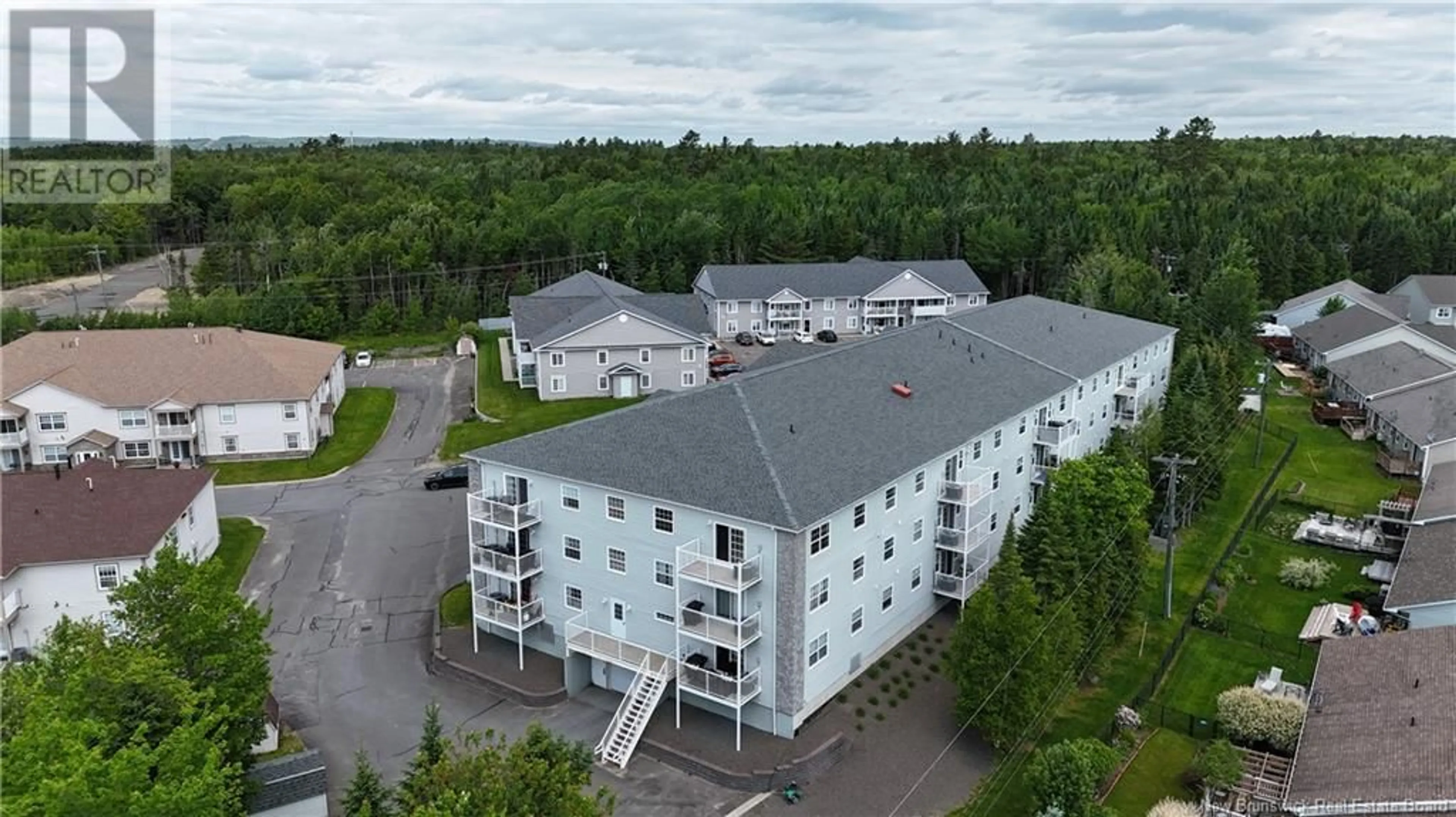 A pic from outside/outdoor area/front of a property/back of a property/a pic from drone, building for 301 - 40 BROWN BOULEVARD, Fredericton New Brunswick E3A0L7