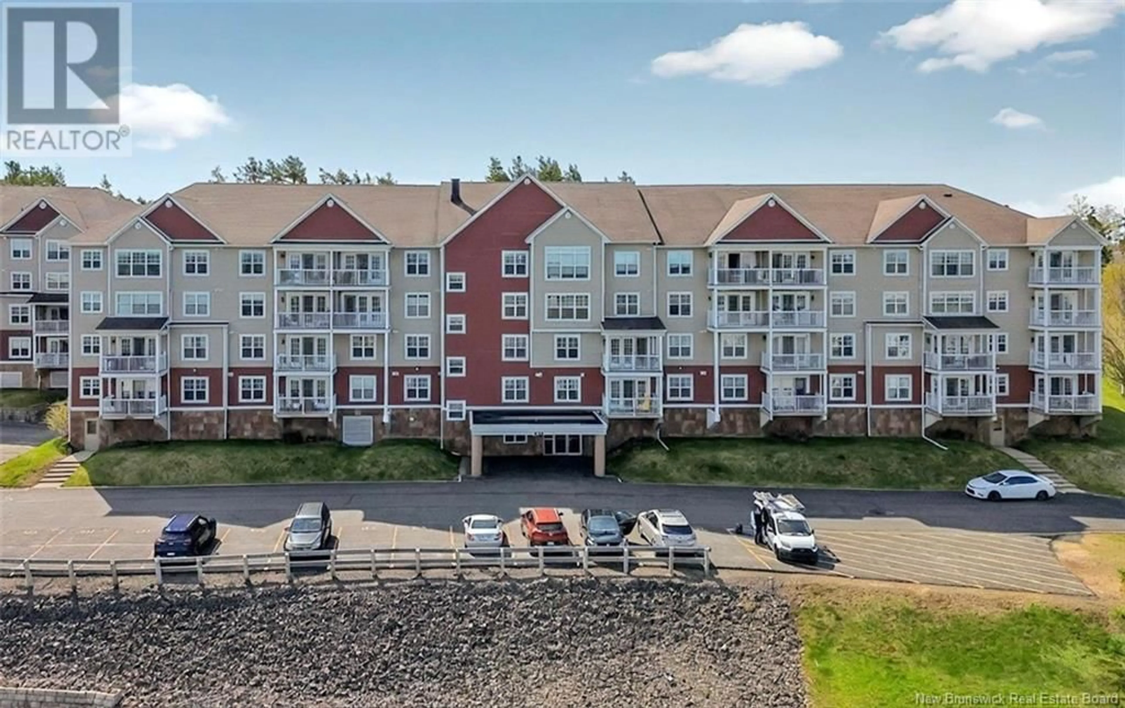 A pic from outside/outdoor area/front of a property/back of a property/a pic from drone, water/lake/river/ocean view for 404 - 208 COVERDALE ROAD, Riverview New Brunswick E1B0M7