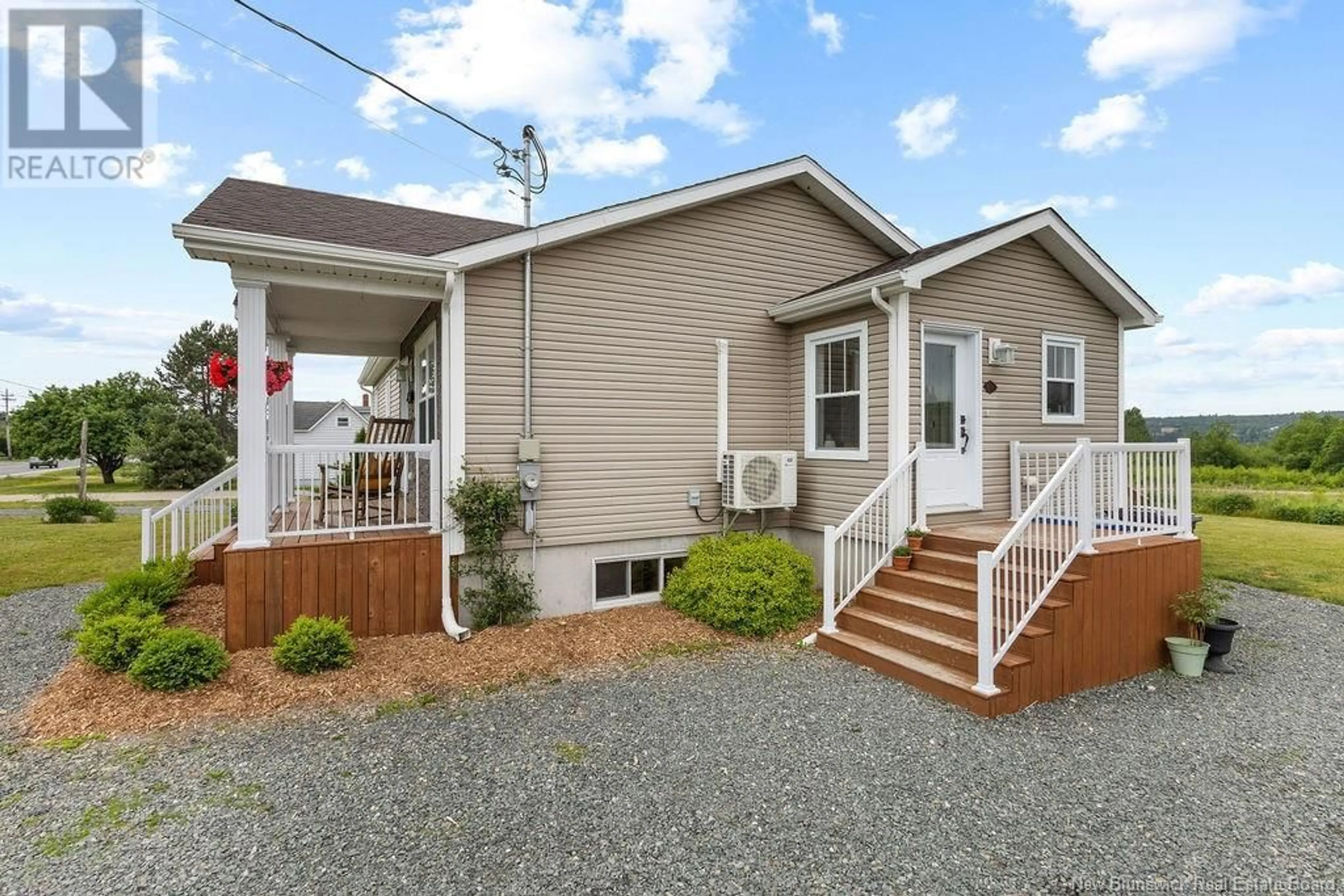 Home with vinyl exterior material, street for 597 WATER STREET, Miramichi New Brunswick E1N4B9