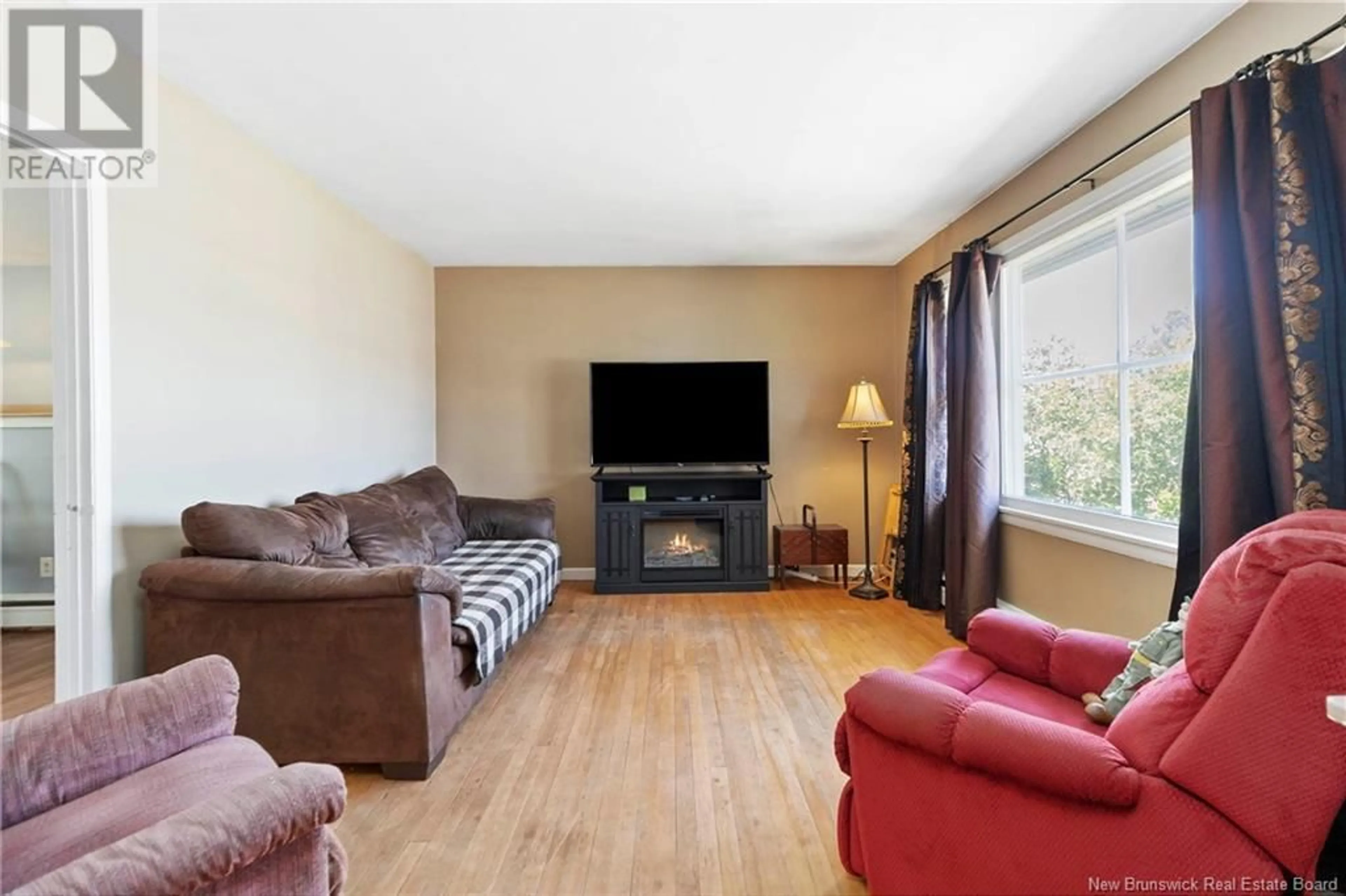 Living room with furniture, wood/laminate floor for 6 WINDSOR STREET, Riverview New Brunswick E1B2X6