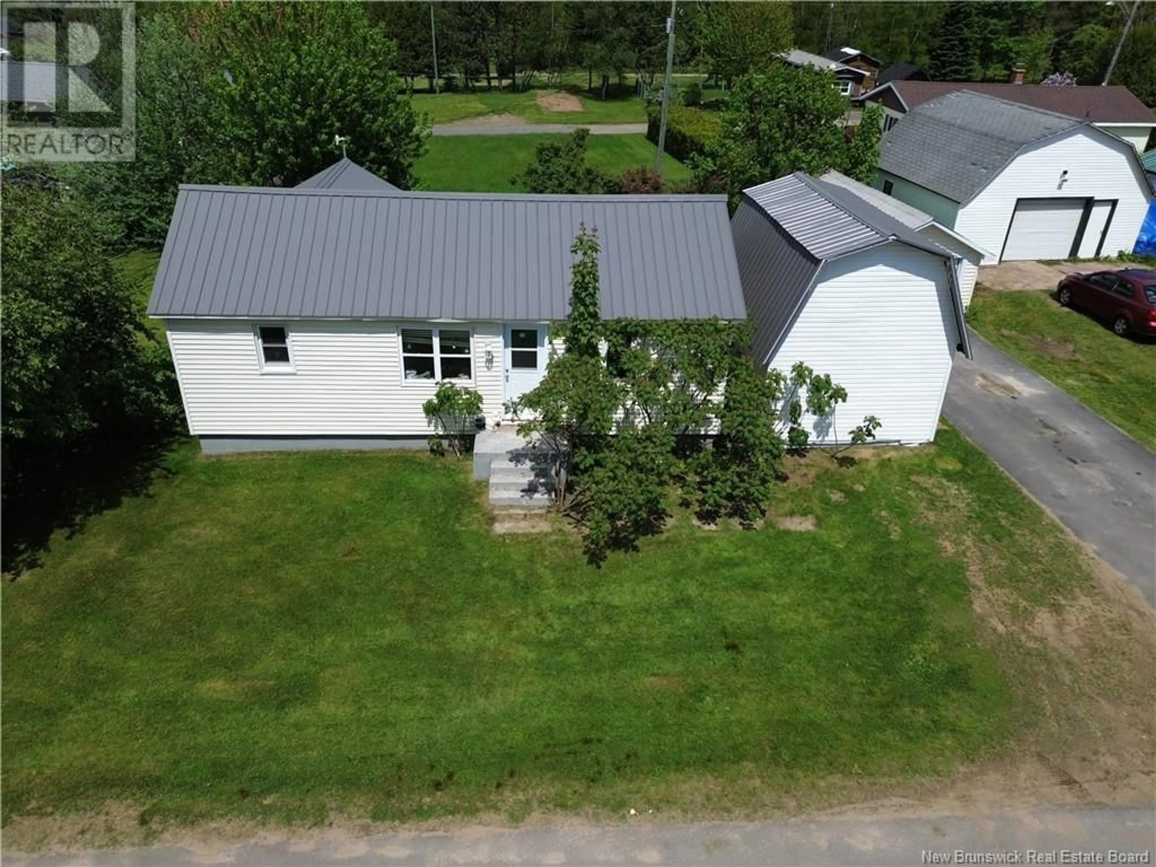 A pic from outside/outdoor area/front of a property/back of a property/a pic from drone, unknown for 9 SMYTHE STREET, Chipman New Brunswick E4A2N8