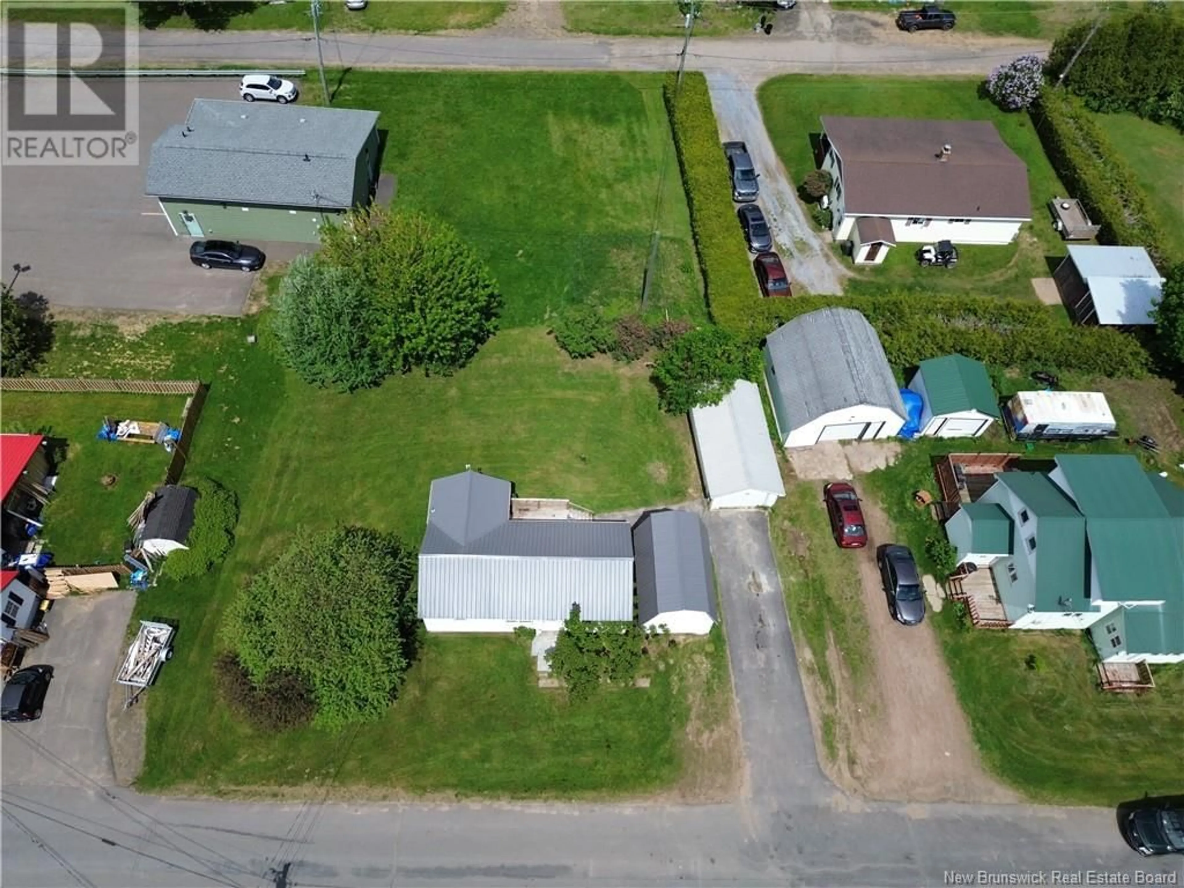 A pic from outside/outdoor area/front of a property/back of a property/a pic from drone, street for 9 SMYTHE STREET, Chipman New Brunswick E4A2N8