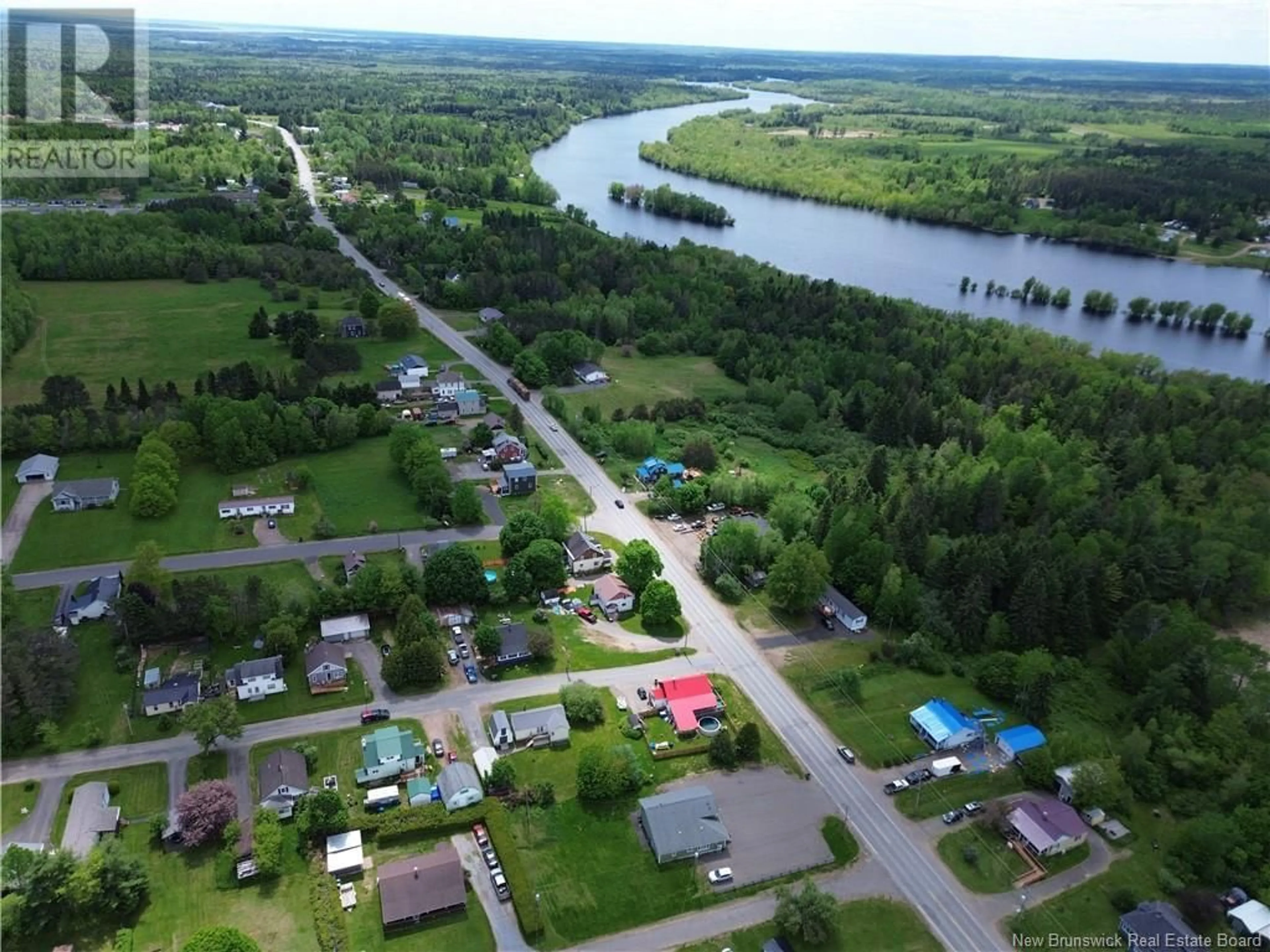 A pic from outside/outdoor area/front of a property/back of a property/a pic from drone, water/lake/river/ocean view for 9 SMYTHE STREET, Chipman New Brunswick E4A2N8