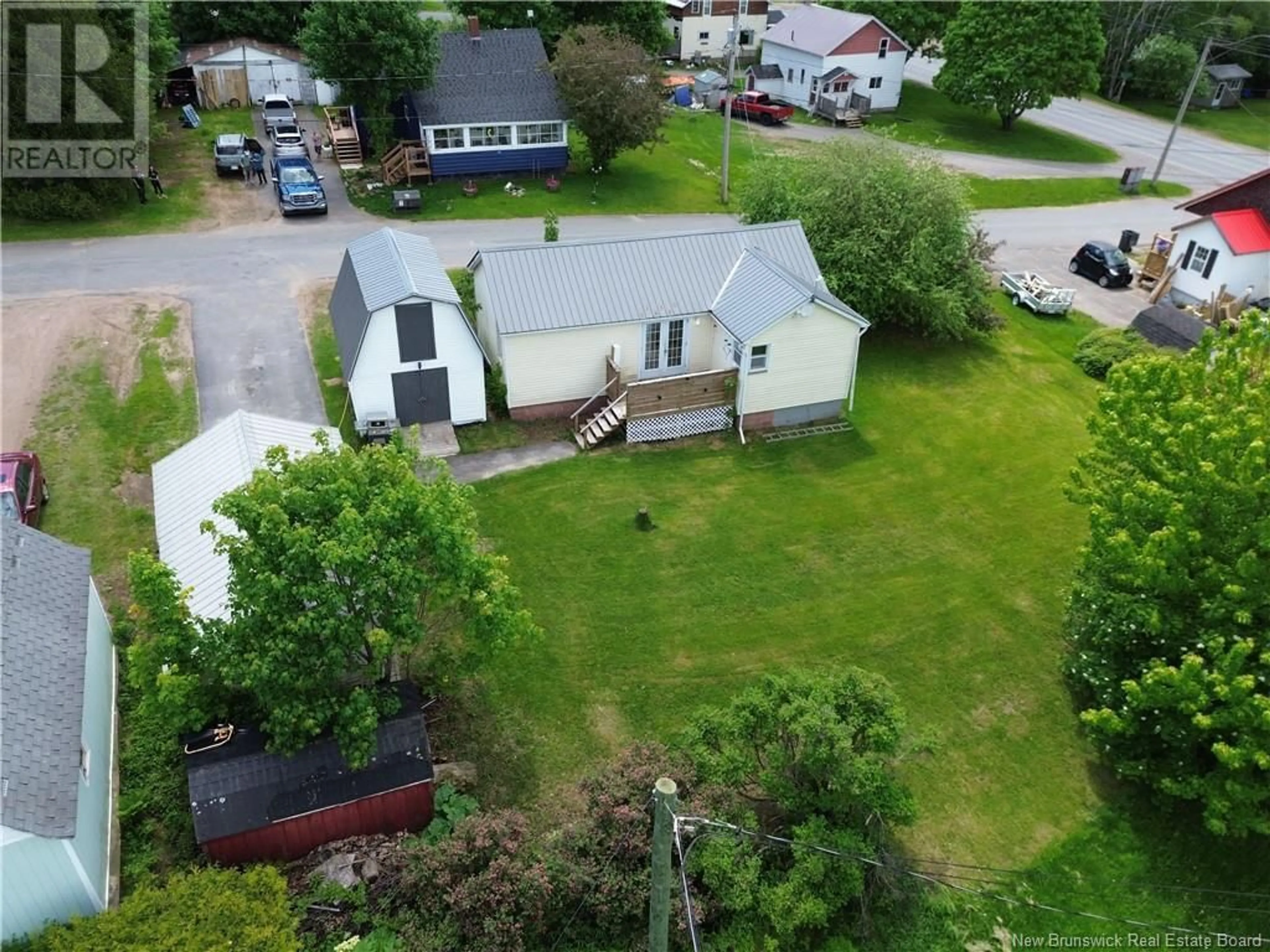 A pic from outside/outdoor area/front of a property/back of a property/a pic from drone, street for 9 SMYTHE STREET, Chipman New Brunswick E4A2N8