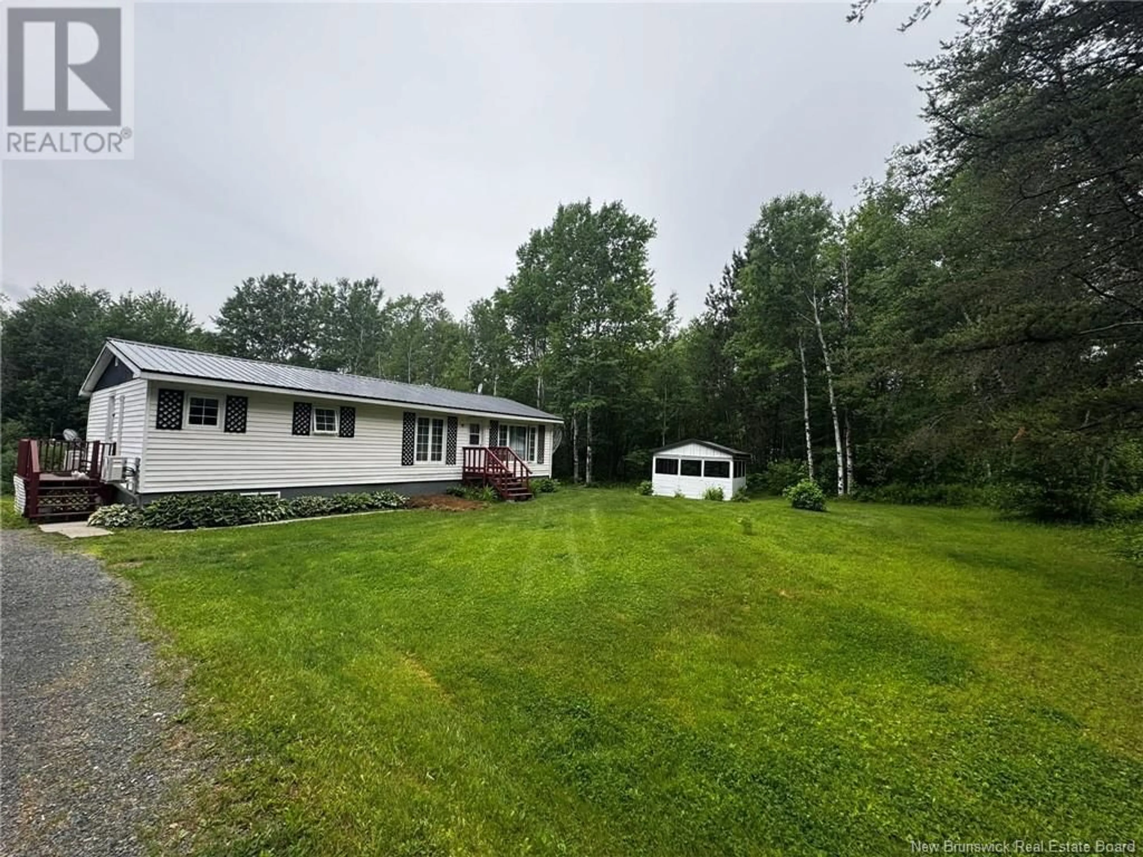A pic from outside/outdoor area/front of a property/back of a property/a pic from drone, water/lake/river/ocean view for 1631 HWY 118, White Rapids New Brunswick E9B1A5