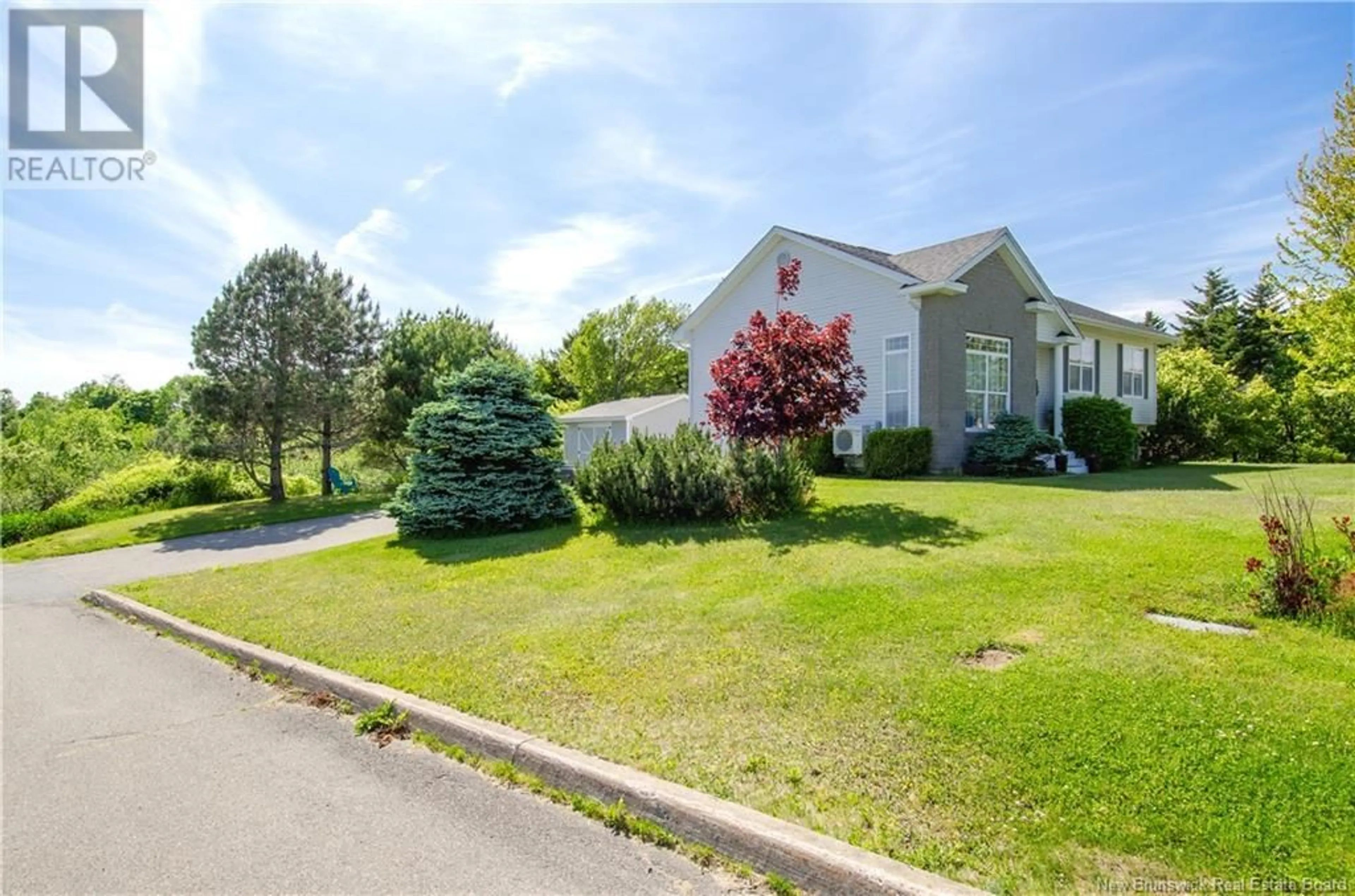 A pic from outside/outdoor area/front of a property/back of a property/a pic from drone, street for 3 OLD LAKE TRAIL, Saint John New Brunswick E2S5B9