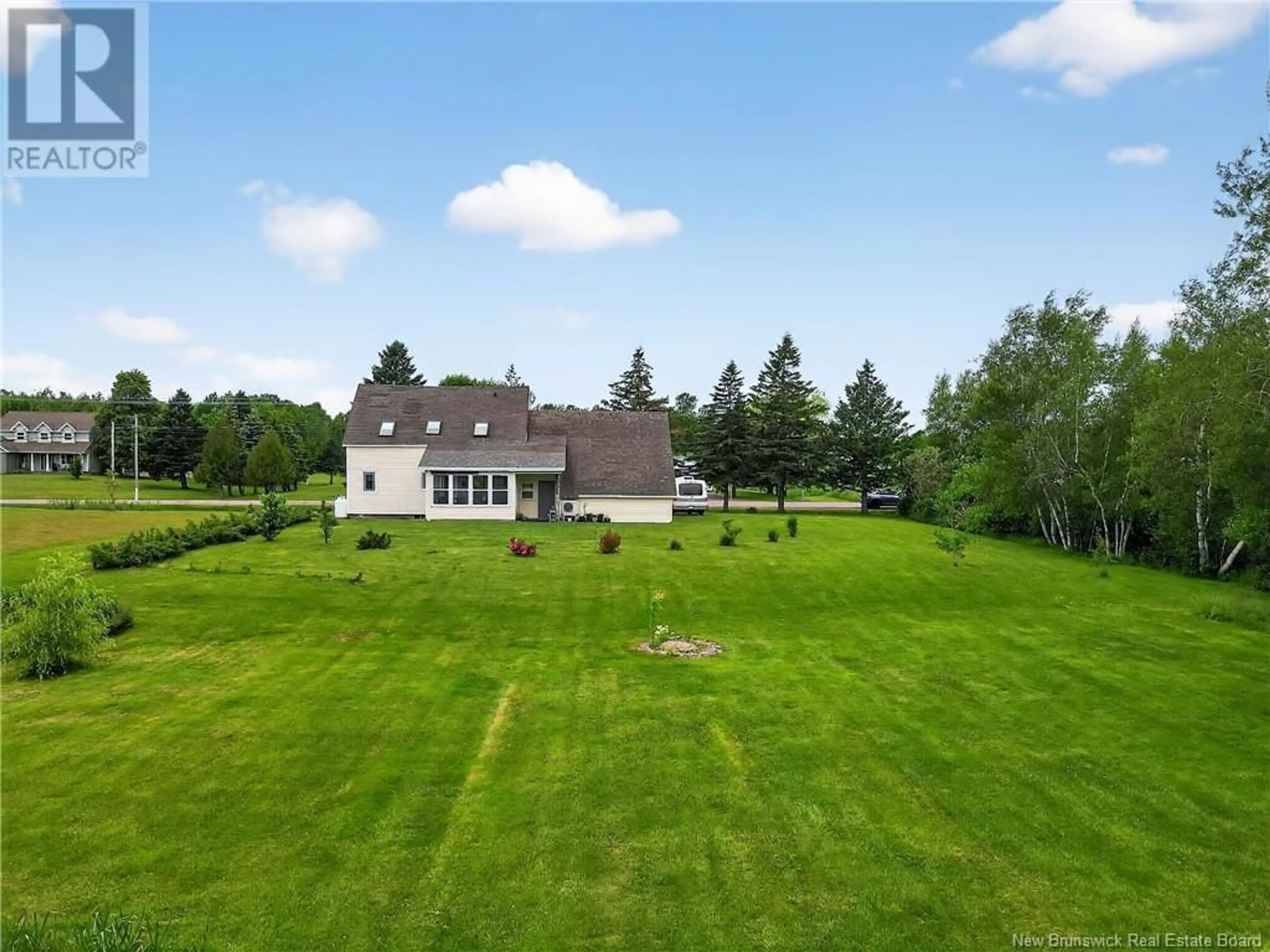 A pic from outside/outdoor area/front of a property/back of a property/a pic from drone, water/lake/river/ocean view for 5107 ROUTE 134, Cocagne New Brunswick E4R2Y6