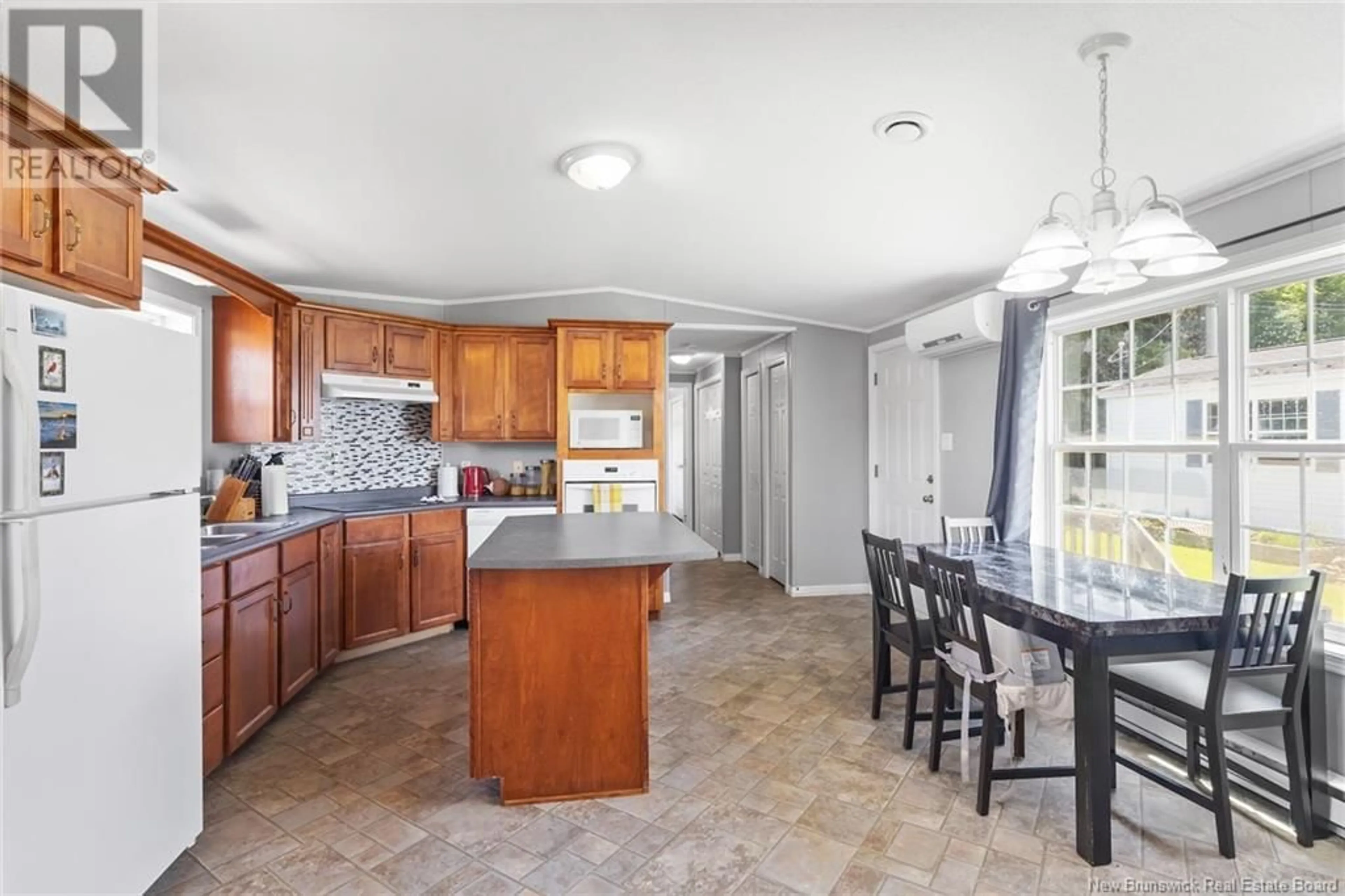 Open concept kitchen, ceramic/tile floor for 140 JACOB STREET, Fredericton New Brunswick E3G0N1