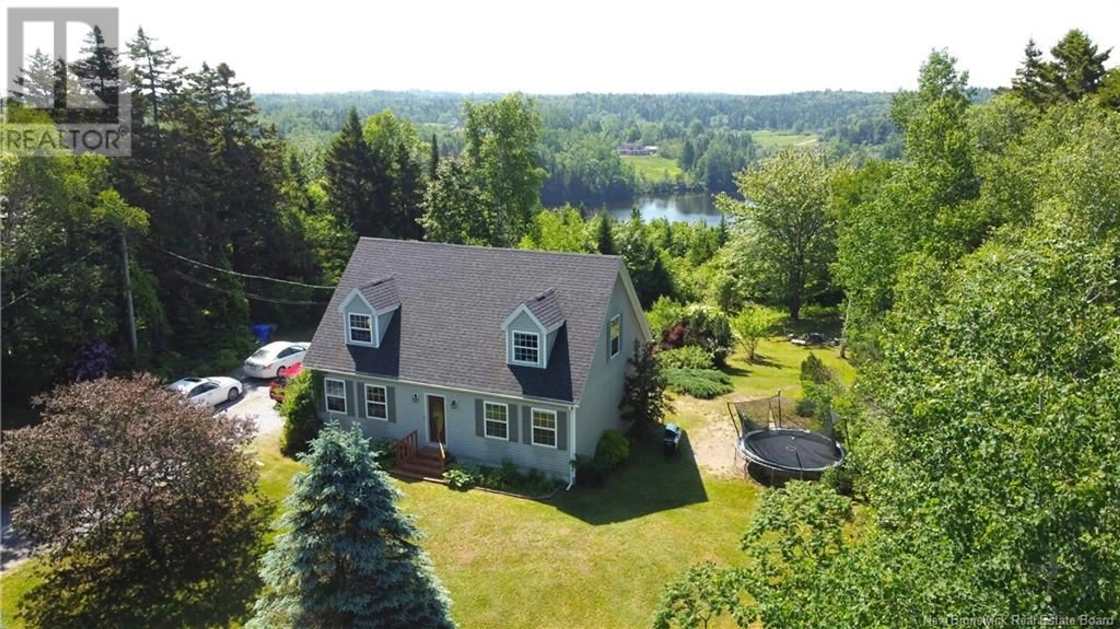 A pic from outside/outdoor area/front of a property/back of a property/a pic from drone, water/lake/river/ocean view for 138 SOUTH STREET, St George New Brunswick E5C3R2