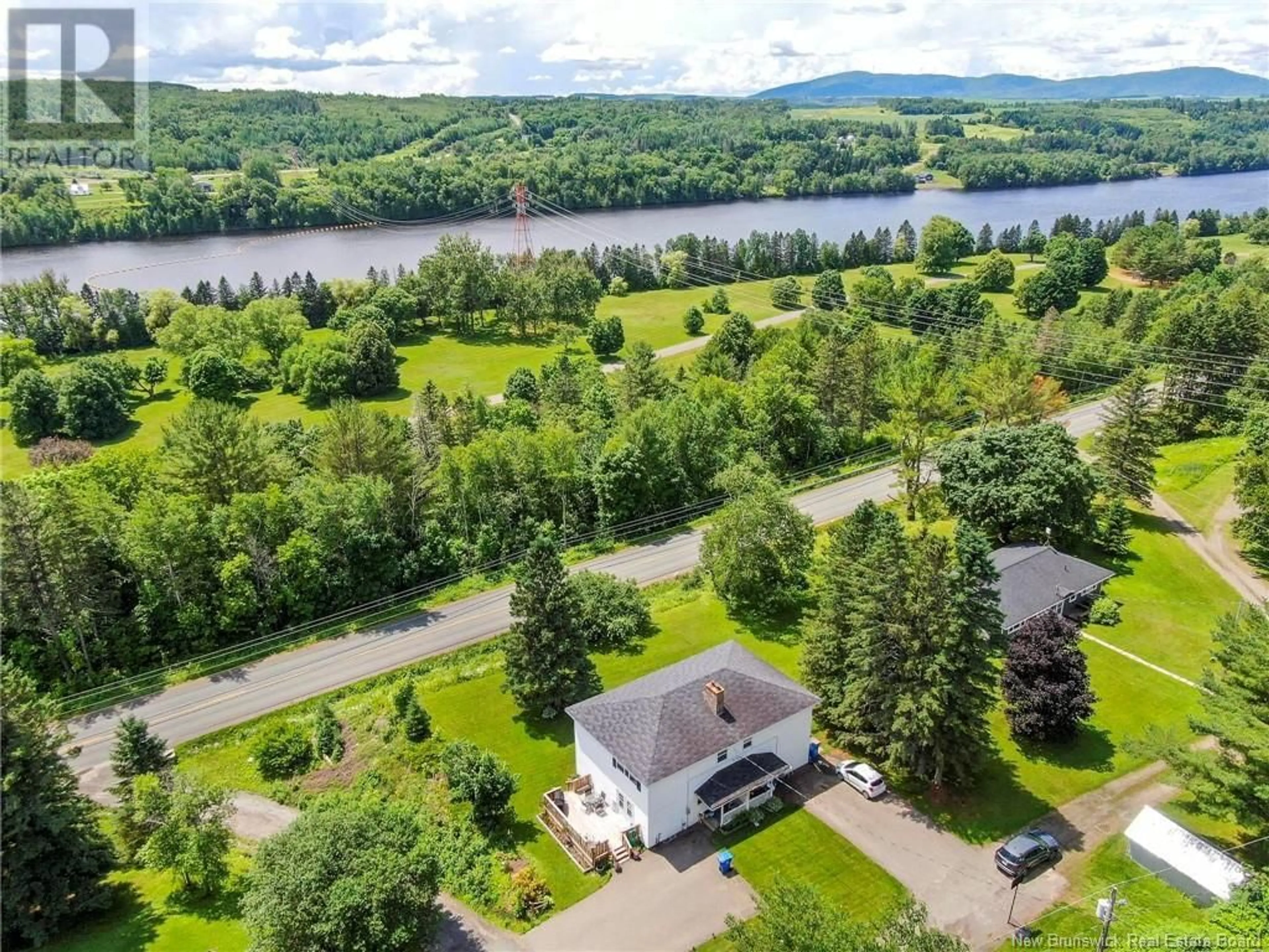 A pic from outside/outdoor area/front of a property/back of a property/a pic from drone, water/lake/river/ocean view for 10236 ROUTE 105, Beechwood New Brunswick E7J2A7