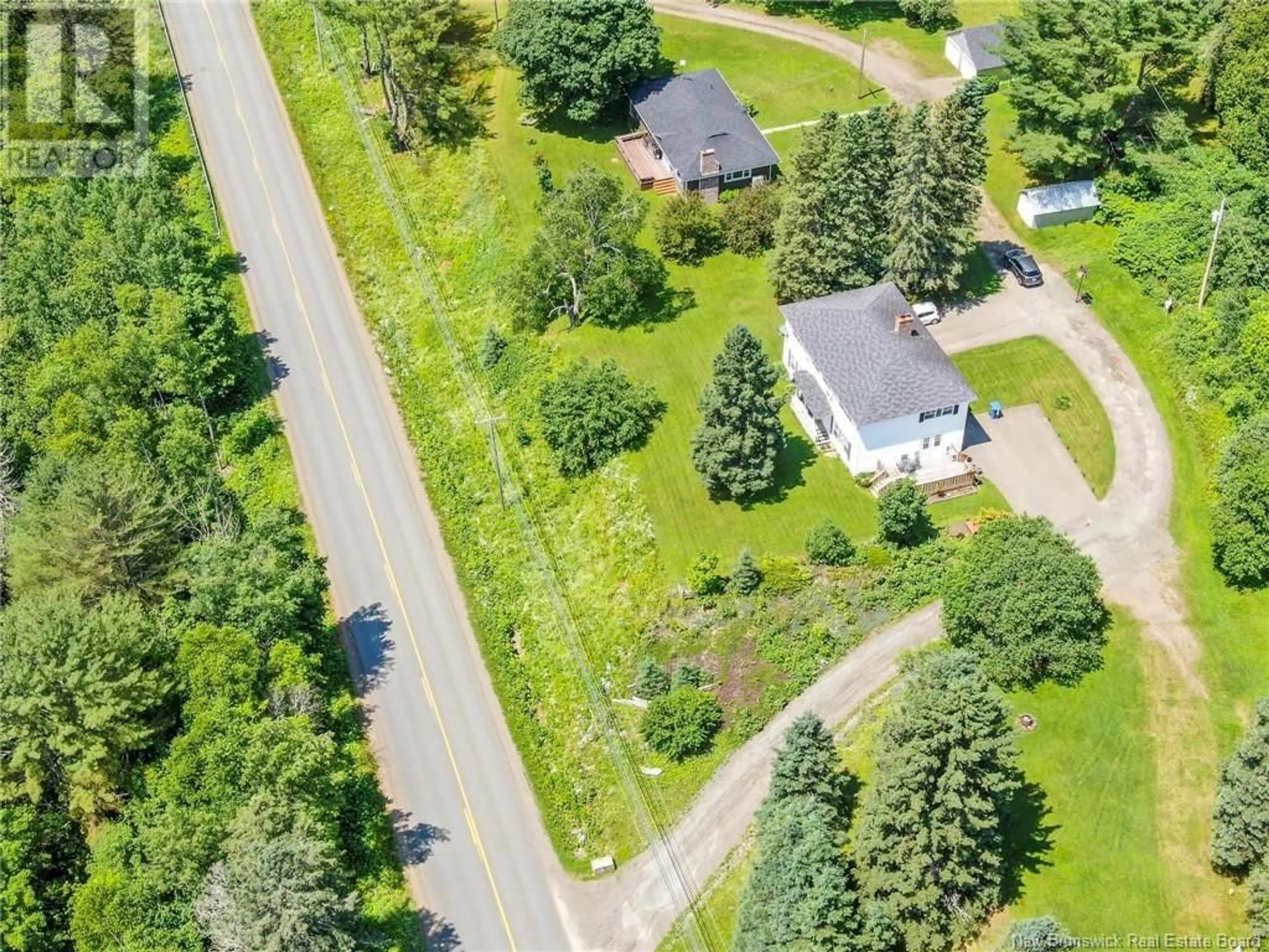 A pic from outside/outdoor area/front of a property/back of a property/a pic from drone, street for 10236 ROUTE 105, Beechwood New Brunswick E7J2A7