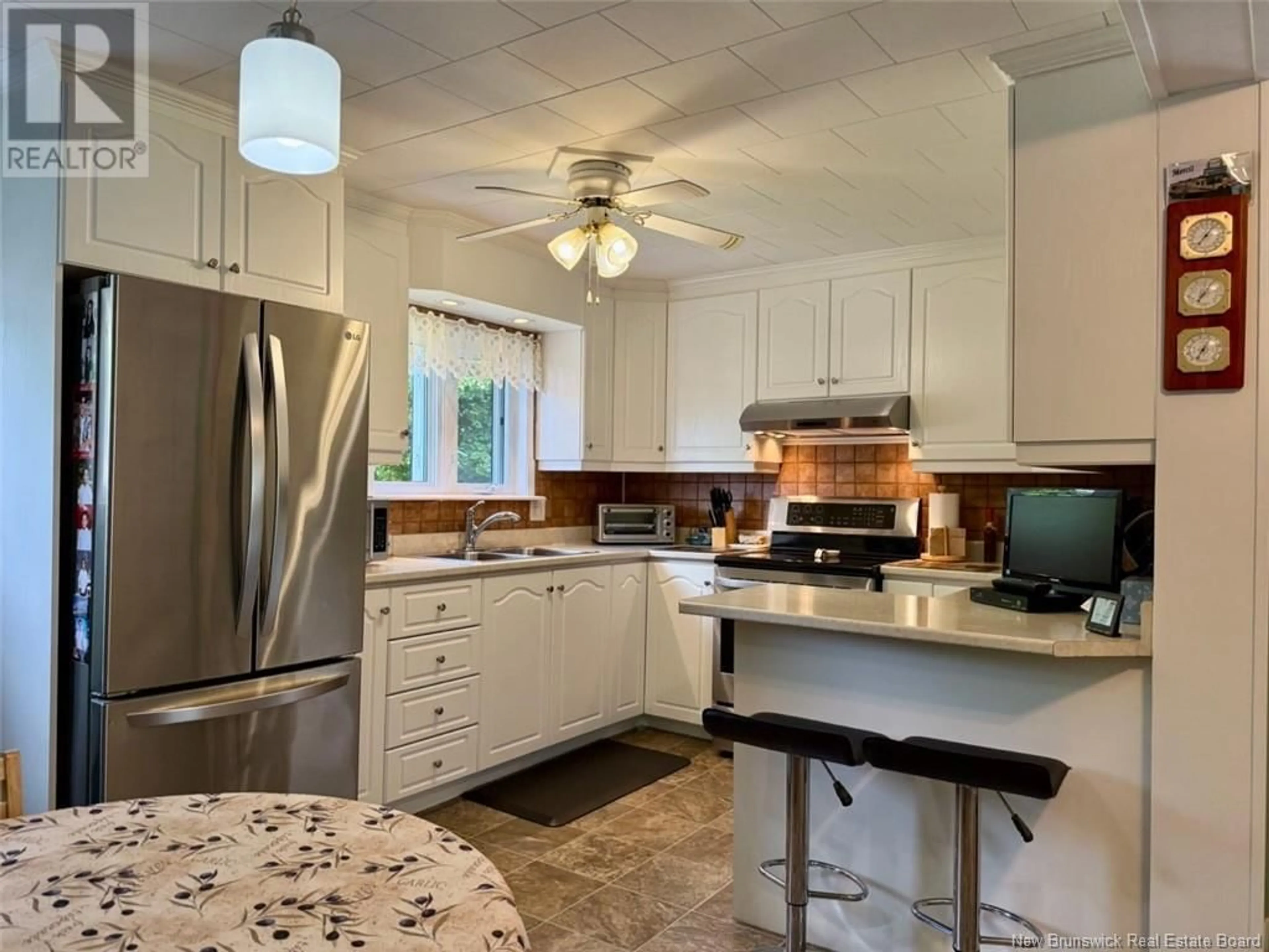 Open concept kitchen, ceramic/tile floor for 159 ST LOUIS STREET, Atholville New Brunswick E3N4C1