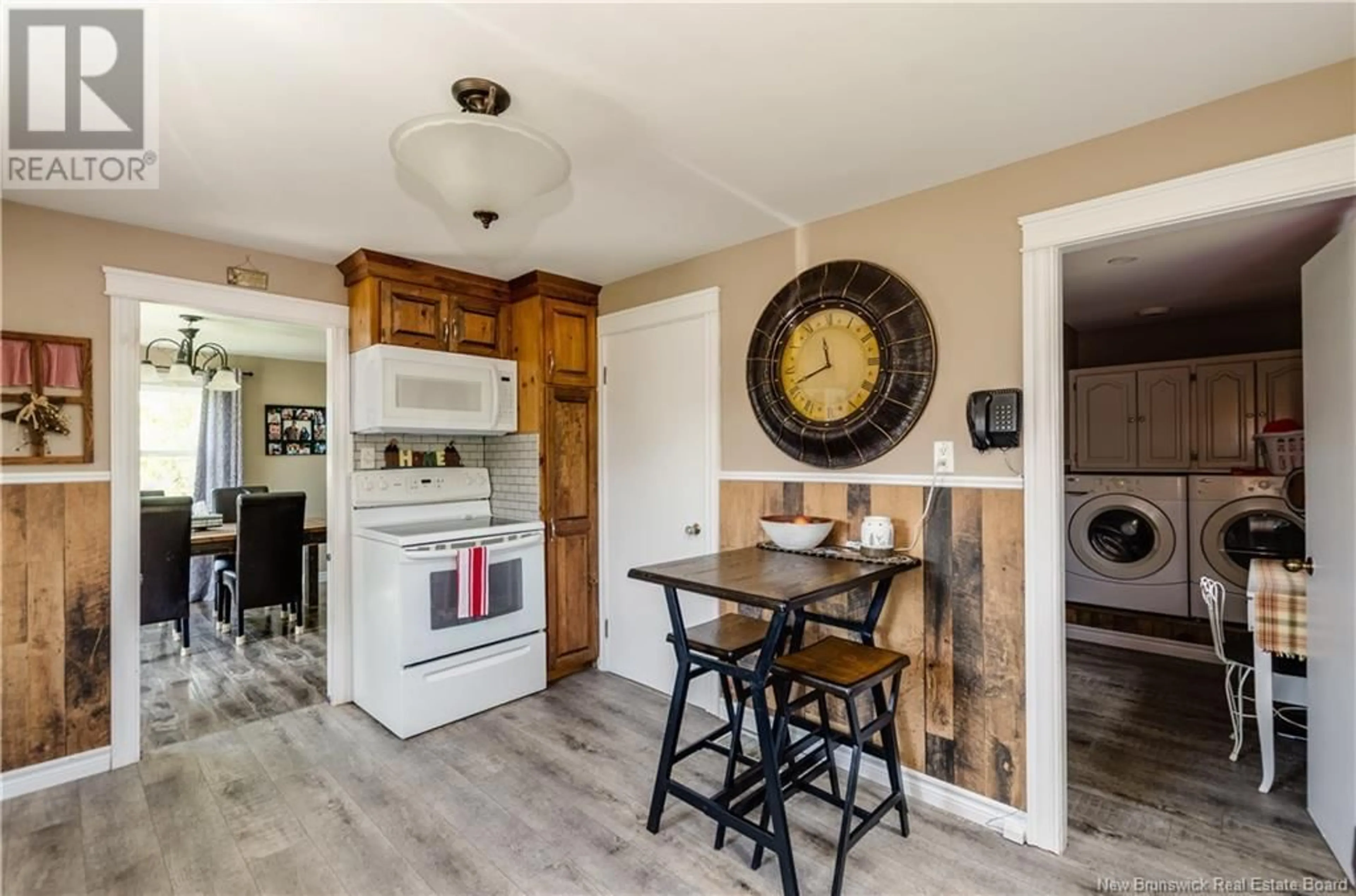 Open concept kitchen, wood/laminate floor for 3002 MAIN STREET, Salisbury New Brunswick E4J2L3