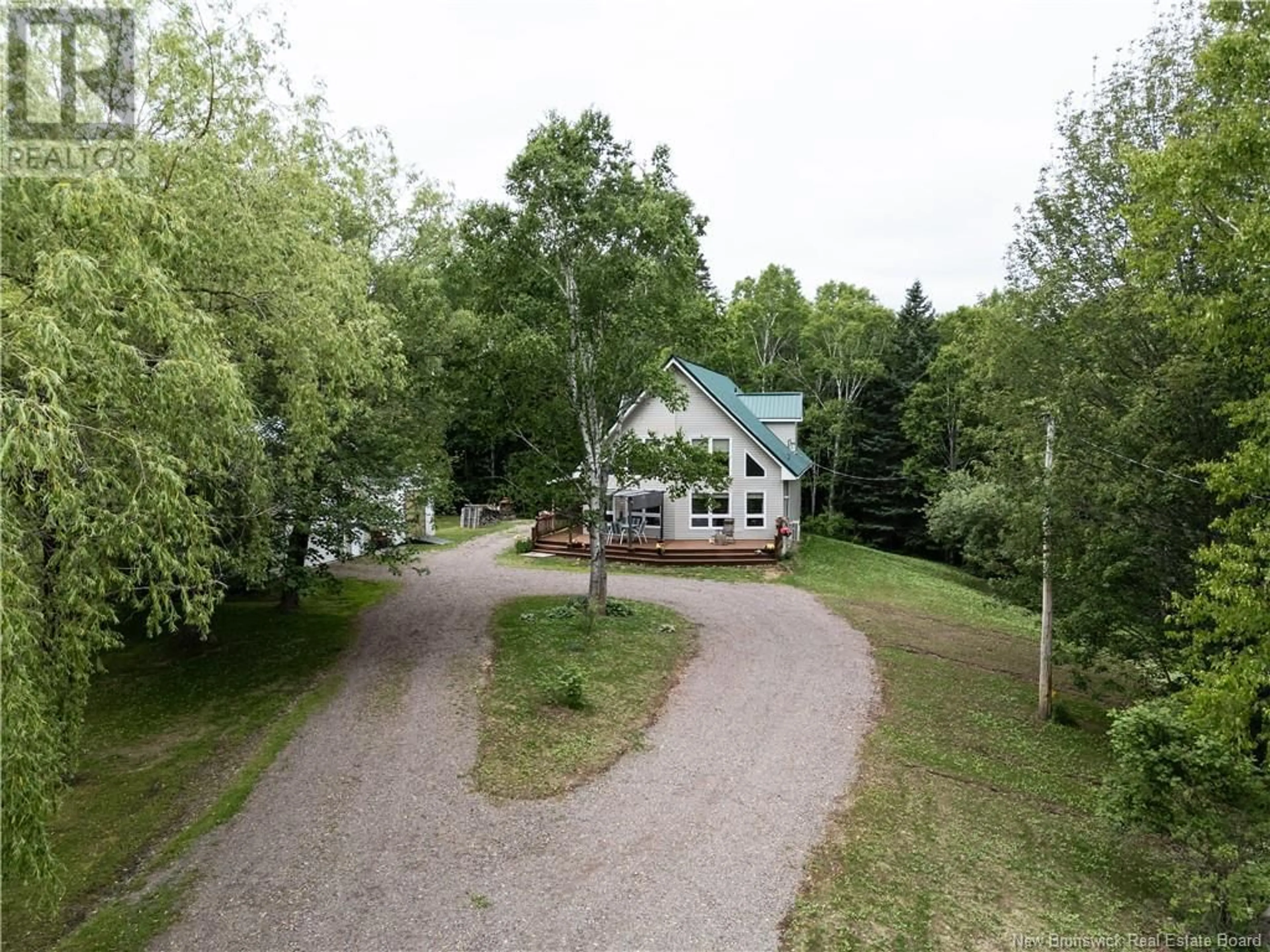 A pic from outside/outdoor area/front of a property/back of a property/a pic from drone, street for 180 BUNKER LANE, Memramcook New Brunswick E4K3V9