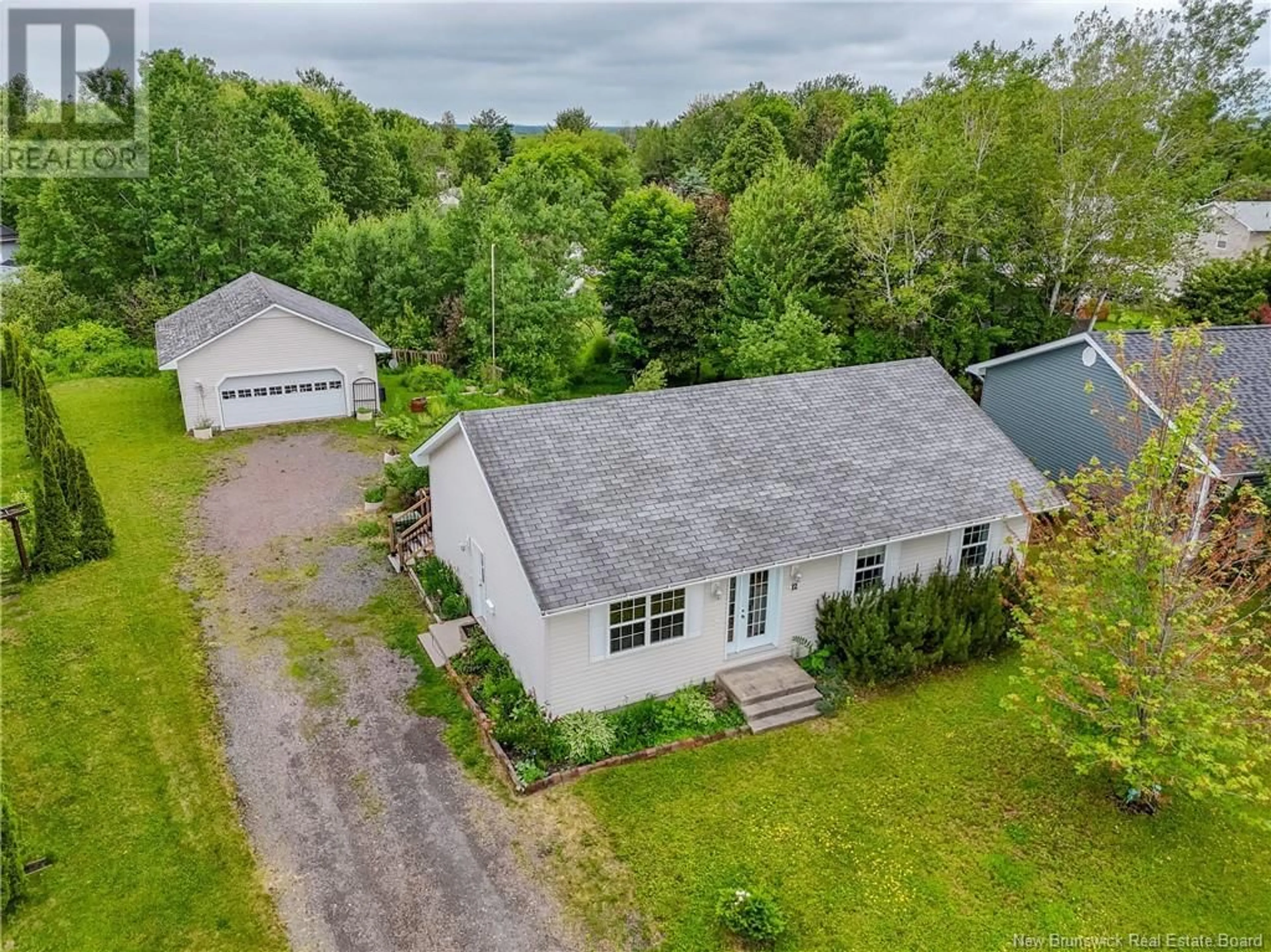 A pic from outside/outdoor area/front of a property/back of a property/a pic from drone, unknown for 12 WATLING CRESCENT, Oromocto New Brunswick E2V4M7