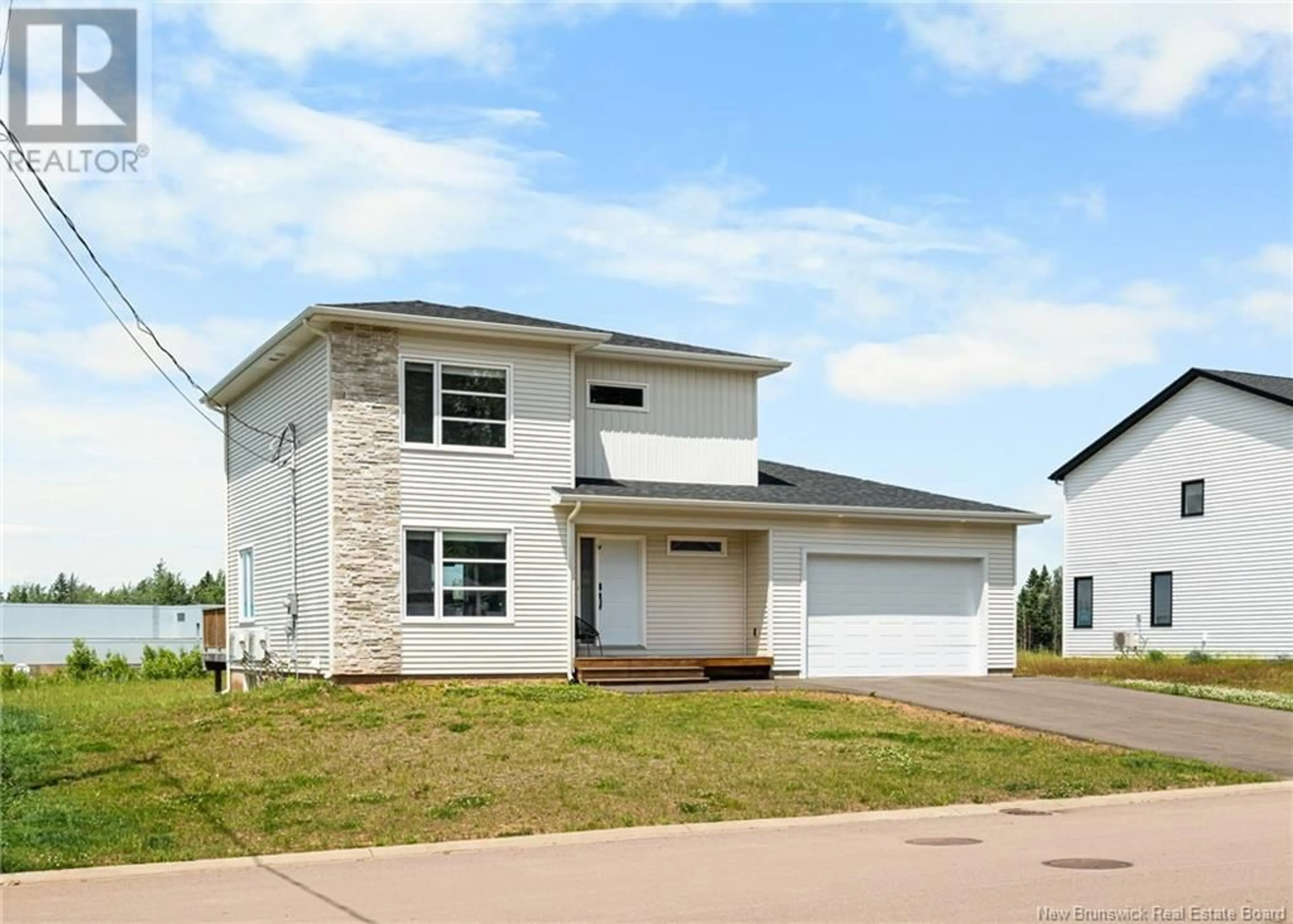Home with vinyl exterior material, street for 98 DES ELEVES STREET, Dieppe New Brunswick E1A4V6