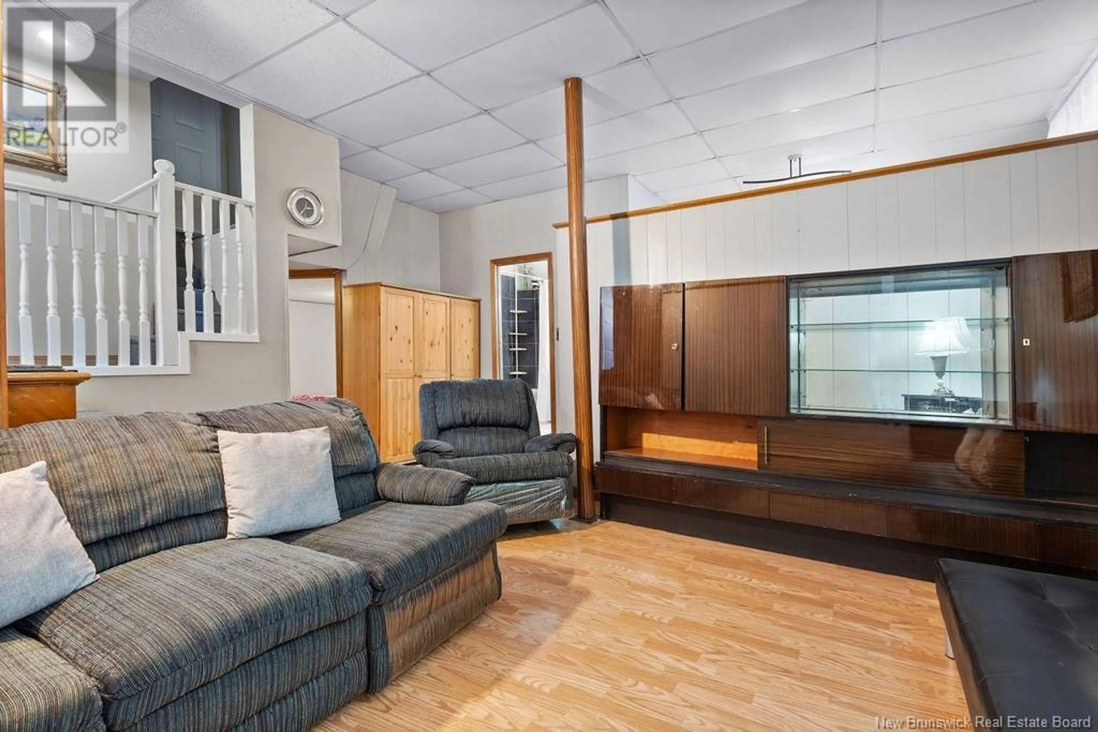 Living room with furniture, unknown for 97 UNIVERSITY AVENUE, Miramichi New Brunswick E1N2V6