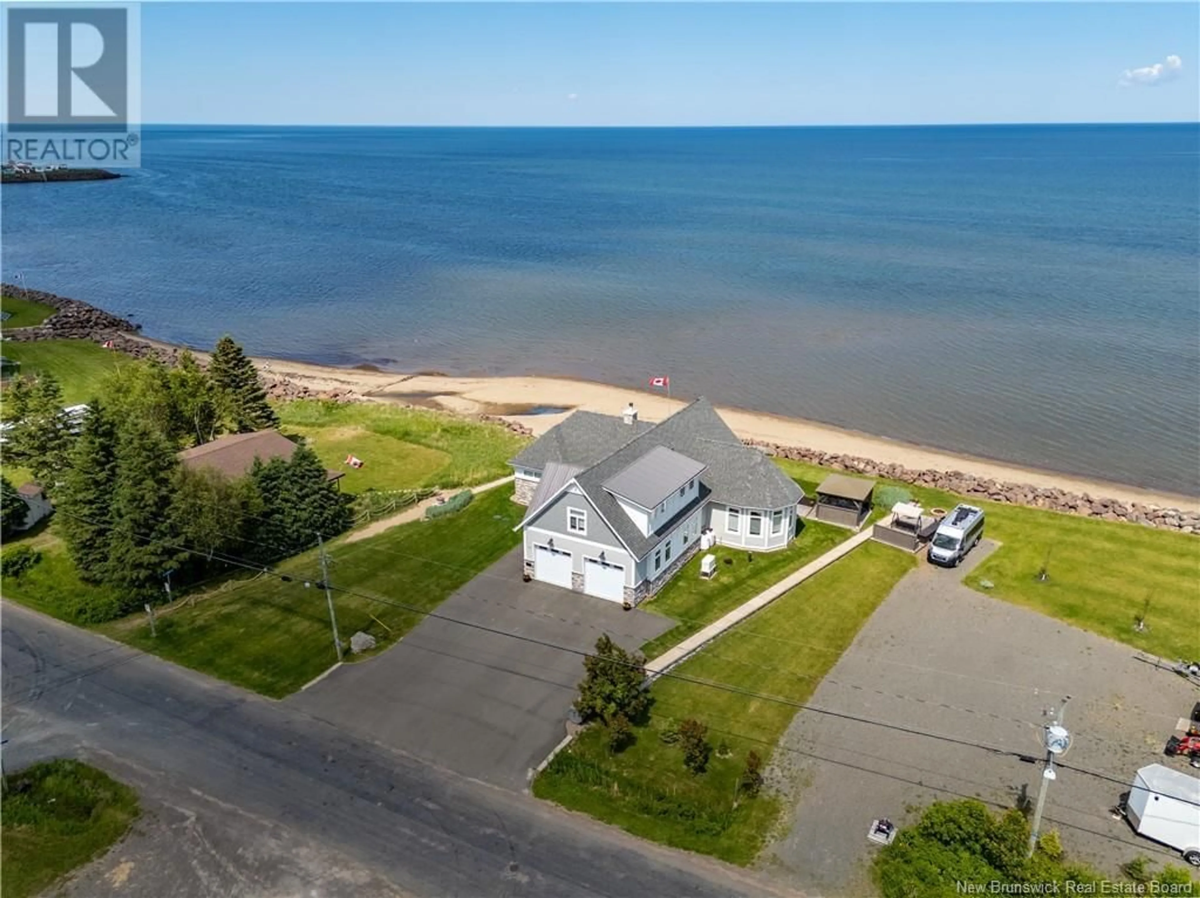 A pic from outside/outdoor area/front of a property/back of a property/a pic from drone, water/lake/river/ocean view for 476 DE LA COTE, Grande-Digue New Brunswick E4R4B5
