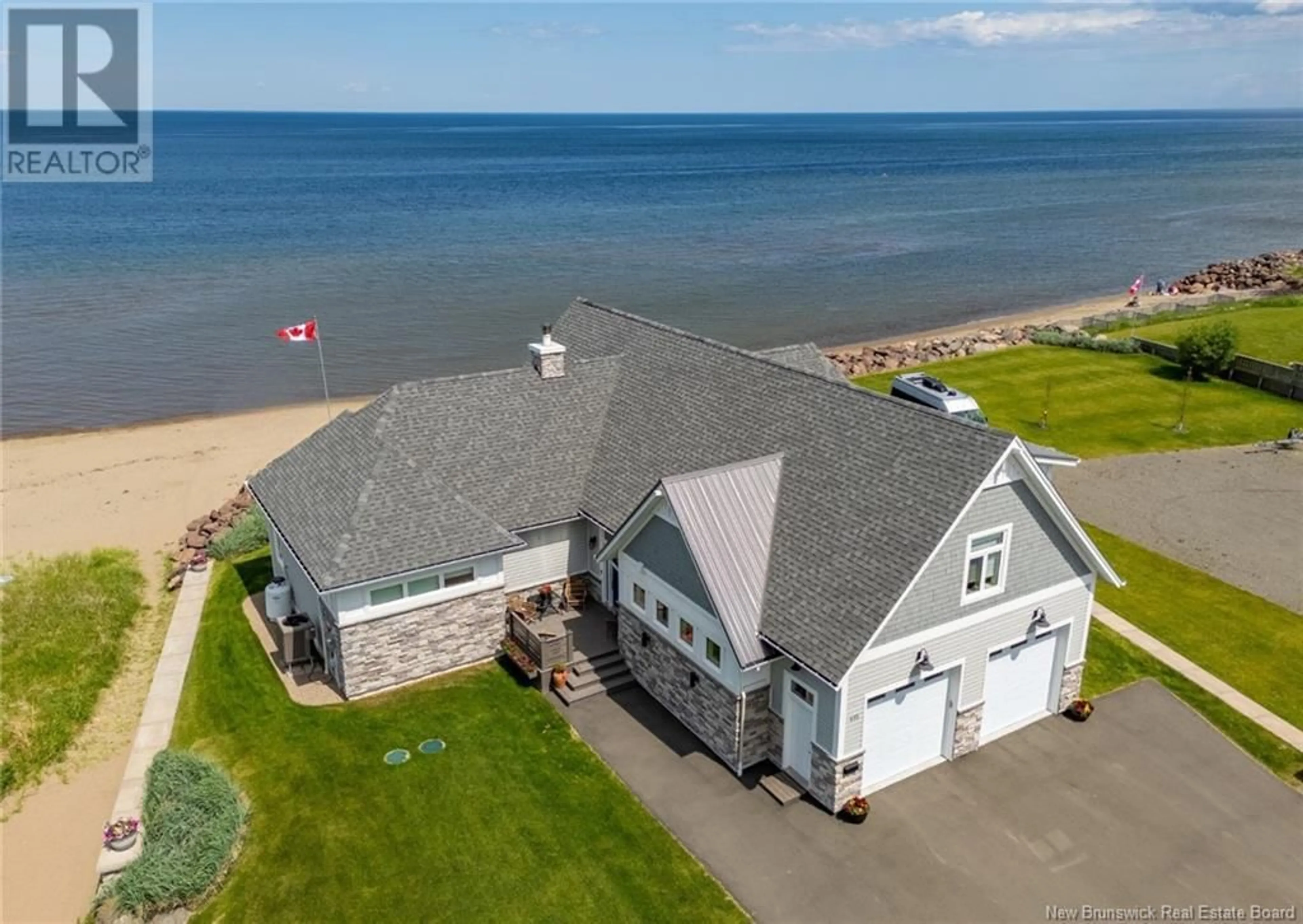 A pic from outside/outdoor area/front of a property/back of a property/a pic from drone, water/lake/river/ocean view for 476 DE LA COTE, Grande-Digue New Brunswick E4R4B5
