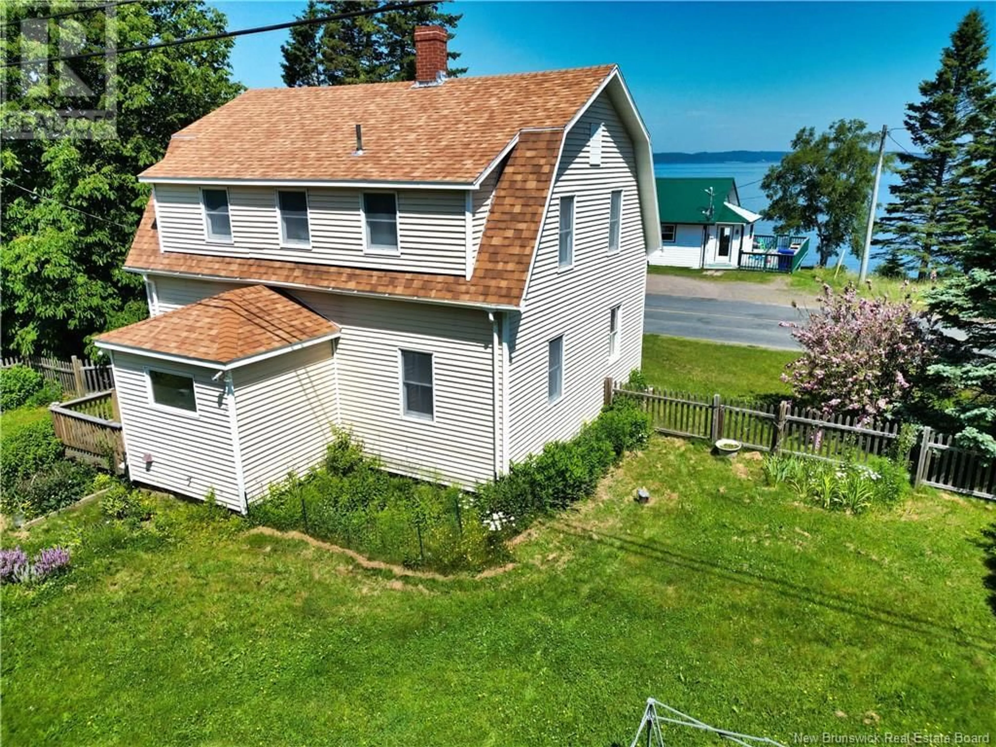 A pic from outside/outdoor area/front of a property/back of a property/a pic from drone, water/lake/river/ocean view for 770 NORTH ROAD, Welshpool New Brunswick E5E1E3