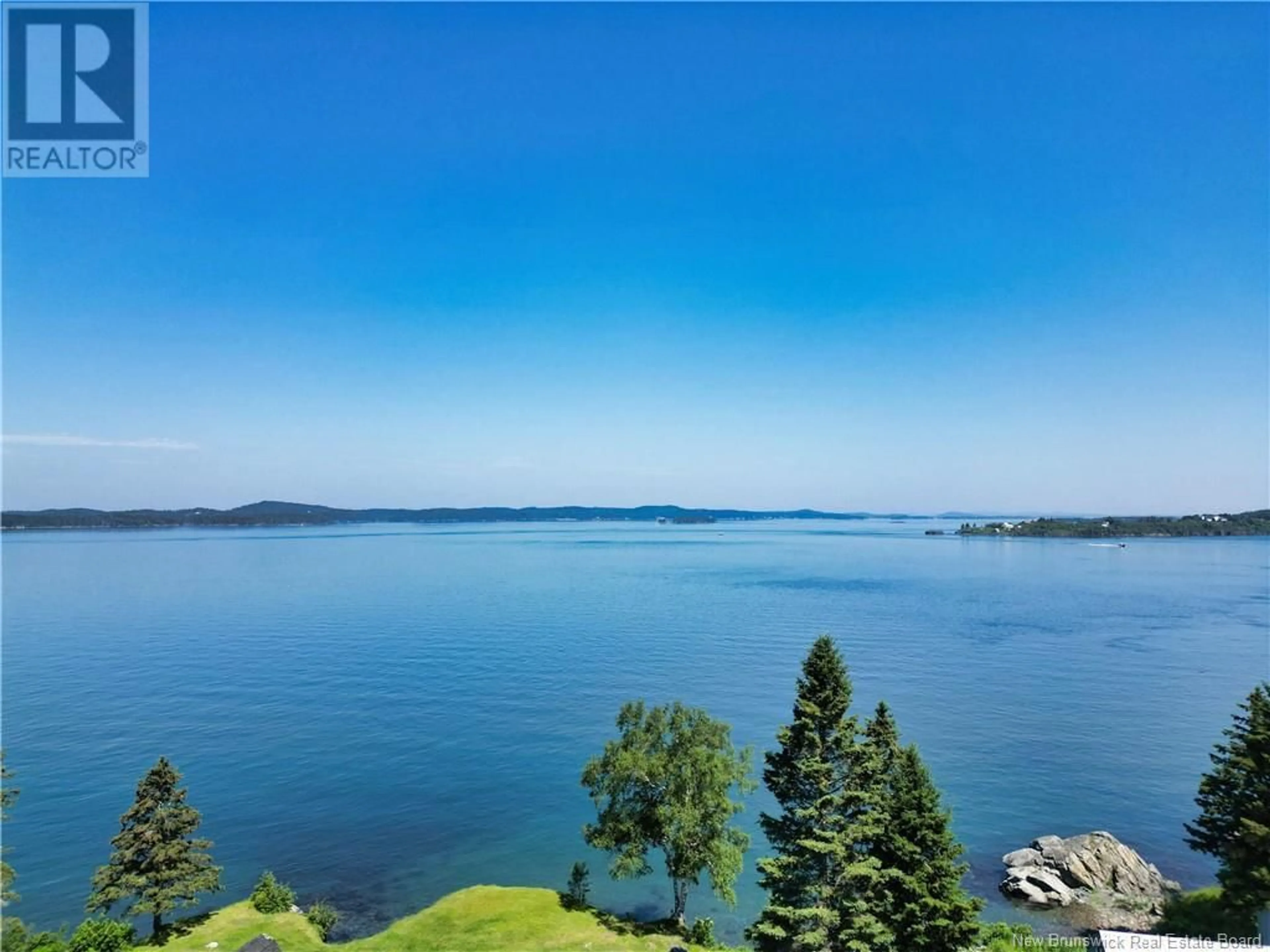 A pic from outside/outdoor area/front of a property/back of a property/a pic from drone, water/lake/river/ocean view for 770 NORTH ROAD, Welshpool New Brunswick E5E1E3