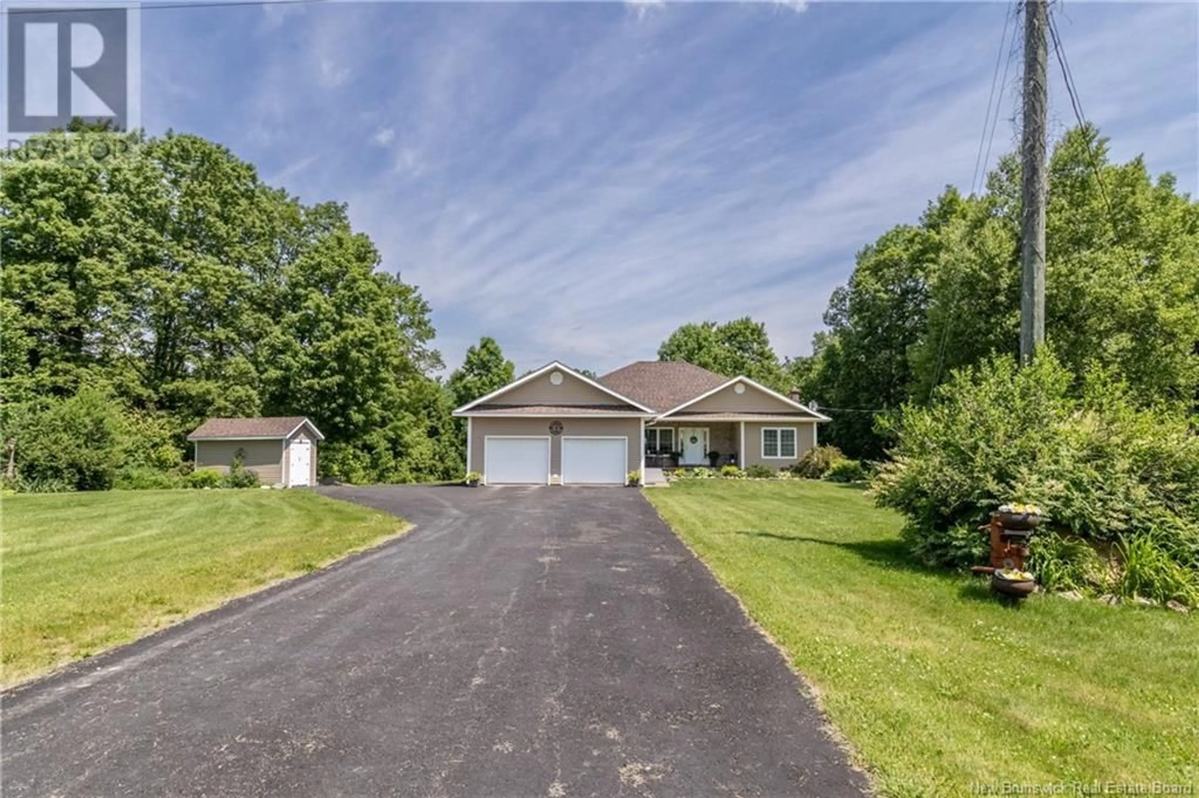 A pic from outside/outdoor area/front of a property/back of a property/a pic from drone, street for 557 ROUTE 165, Riceville New Brunswick E7N2Z3