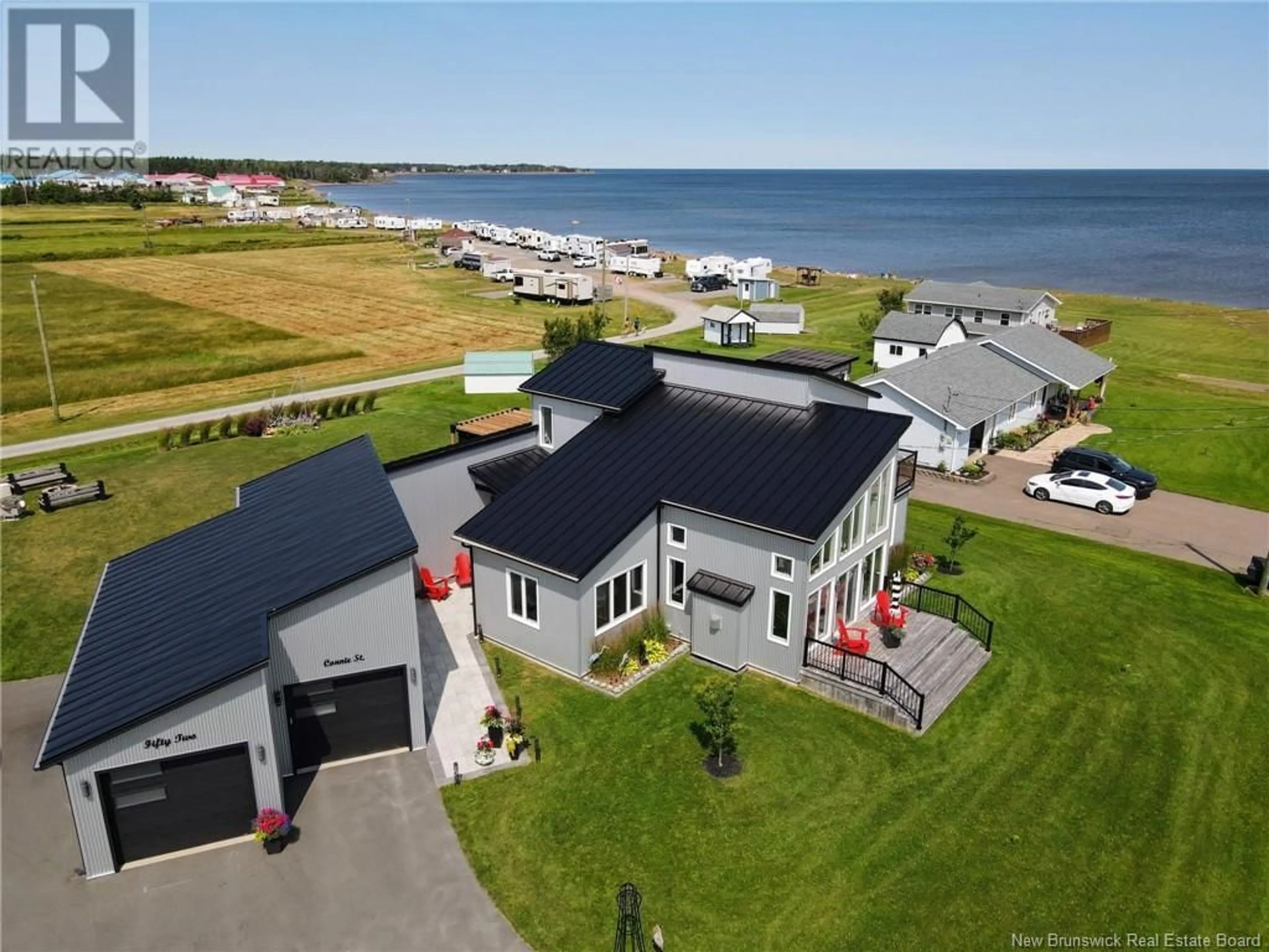 A pic from outside/outdoor area/front of a property/back of a property/a pic from drone, water/lake/river/ocean view for 52 CONNIE ROAD, Trois Ruisseaux New Brunswick E4N2V3