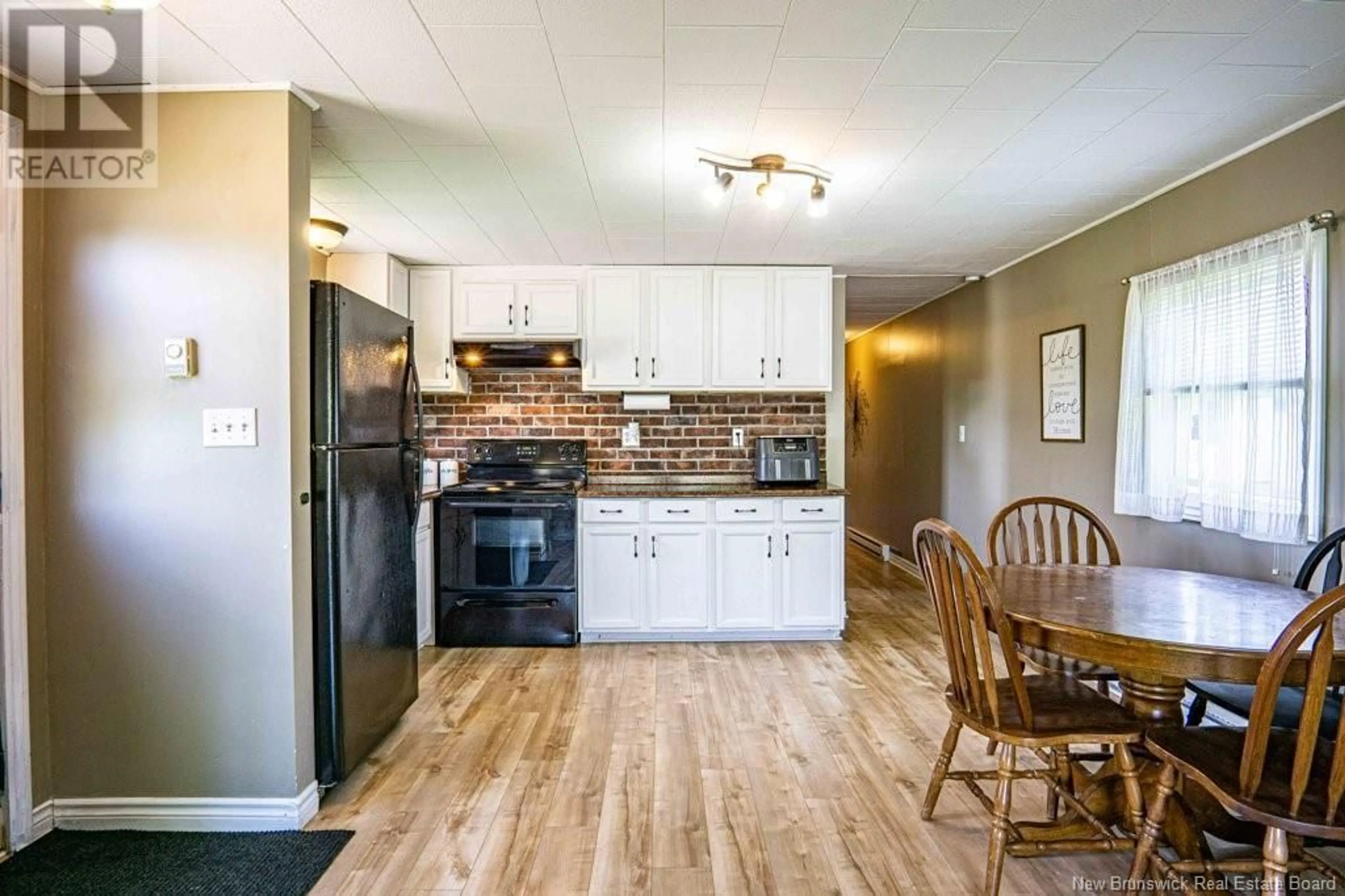 Standard kitchen, wood/laminate floor for 7 NORTHWOOD STREET, Hanwell New Brunswick E3B6R1