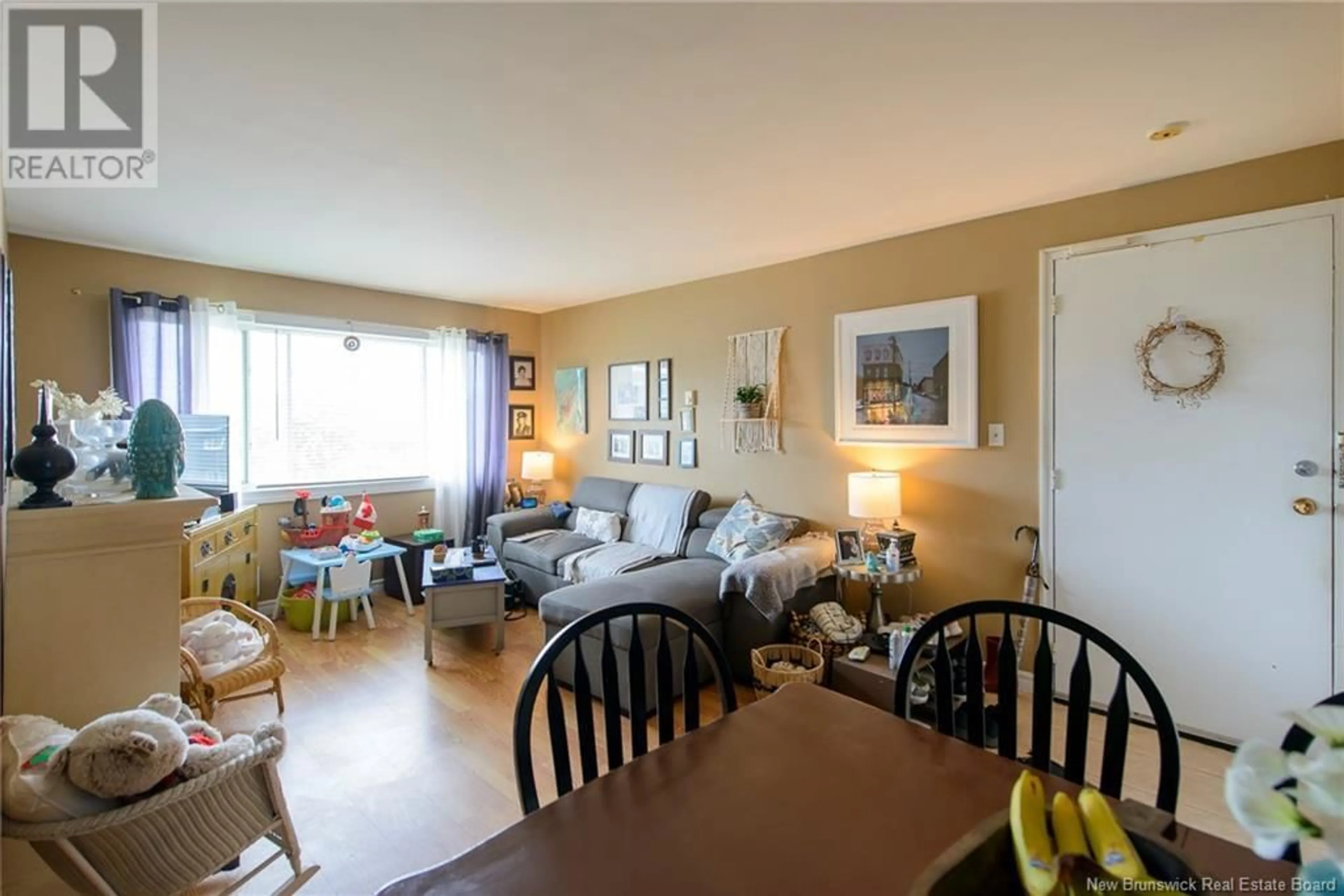 Living room with furniture, wood/laminate floor for 6 - 45 COLDBROOK CRESCENT, Saint John New Brunswick E2J3Z3