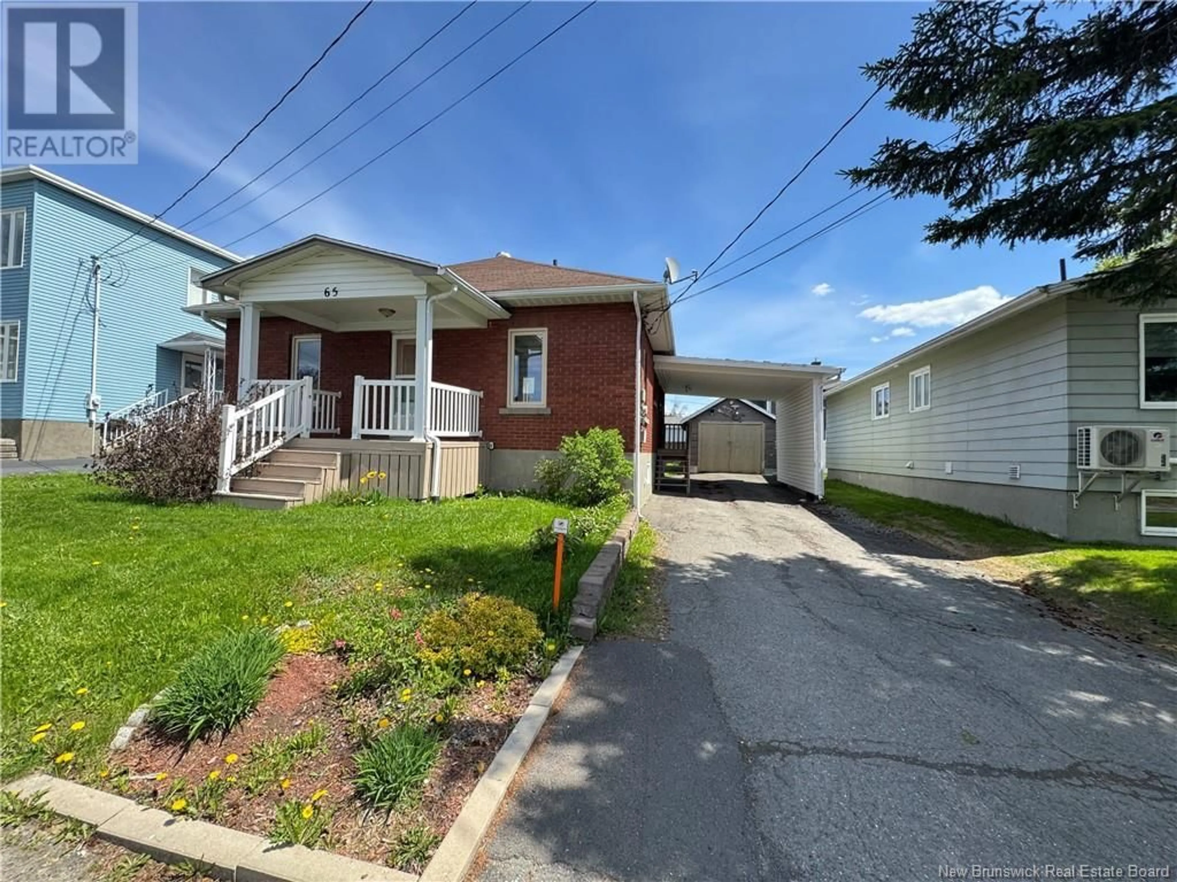 A pic from outside/outdoor area/front of a property/back of a property/a pic from drone, street for 65 ST.-GEORGES, Edmundston New Brunswick E3V2W1