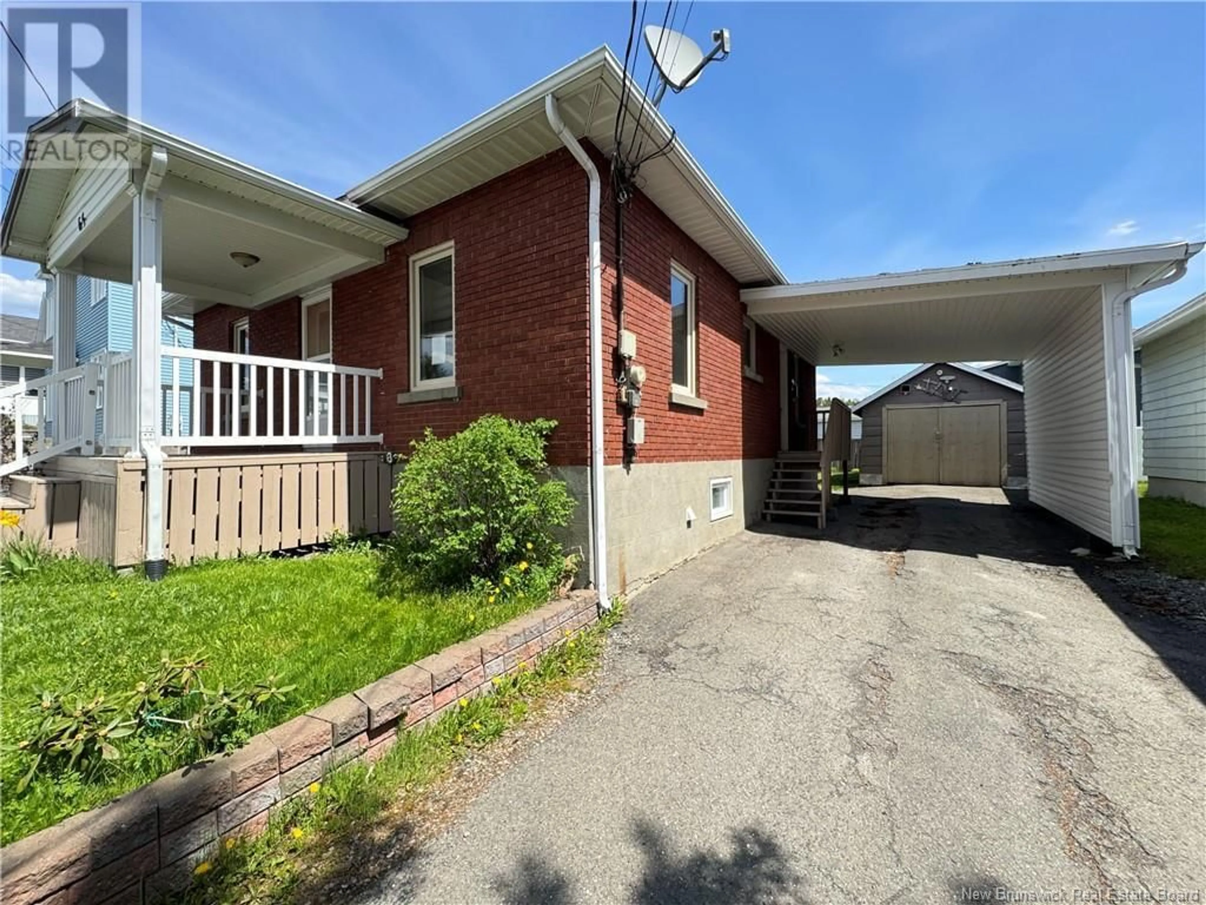 Home with brick exterior material, street for 65 ST.-GEORGES, Edmundston New Brunswick E3V2W1
