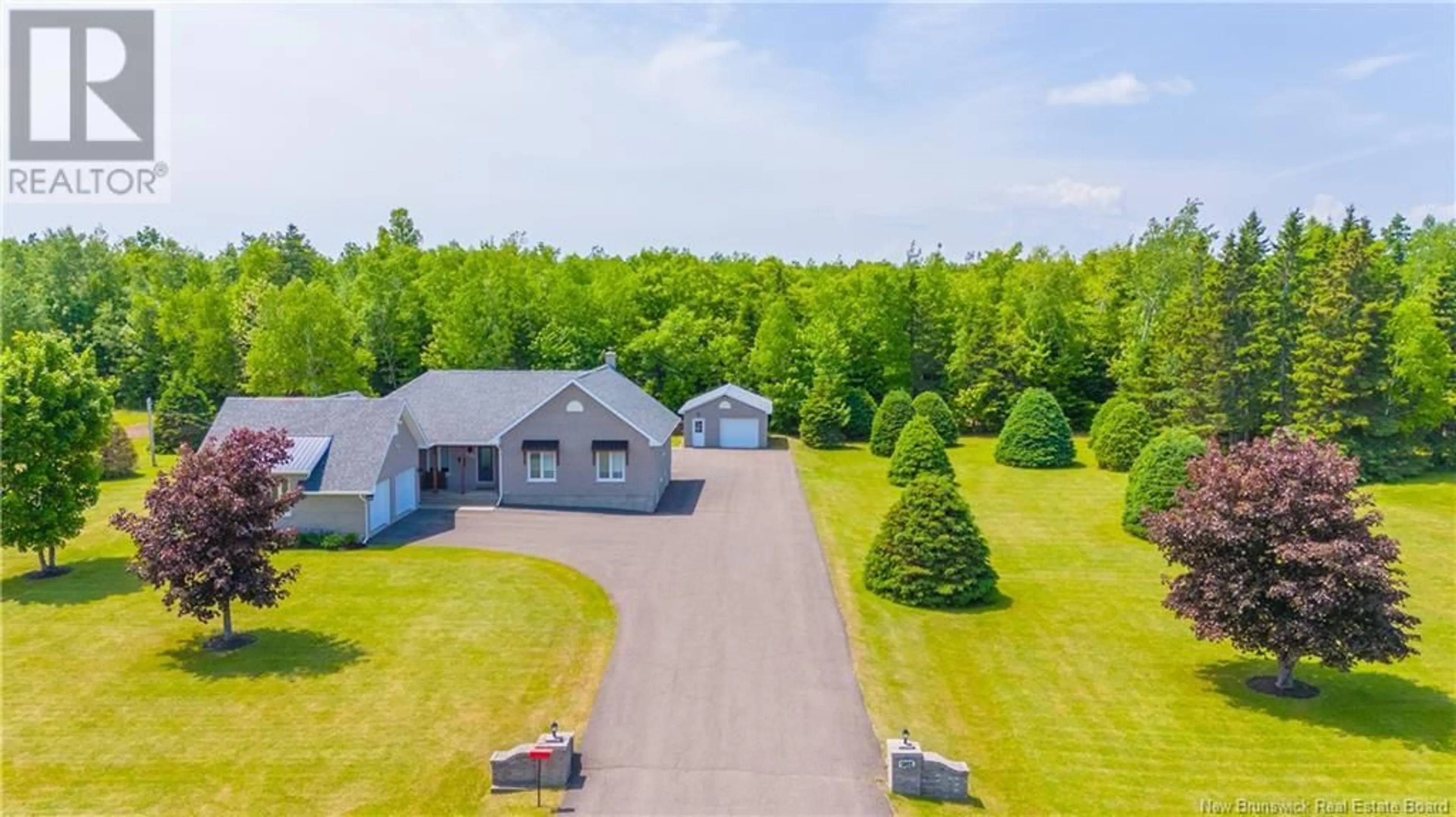A pic from outside/outdoor area/front of a property/back of a property/a pic from drone, water/lake/river/ocean view for 981 135 ROUTE ROUTE, Duguayville New Brunswick E8M1K3