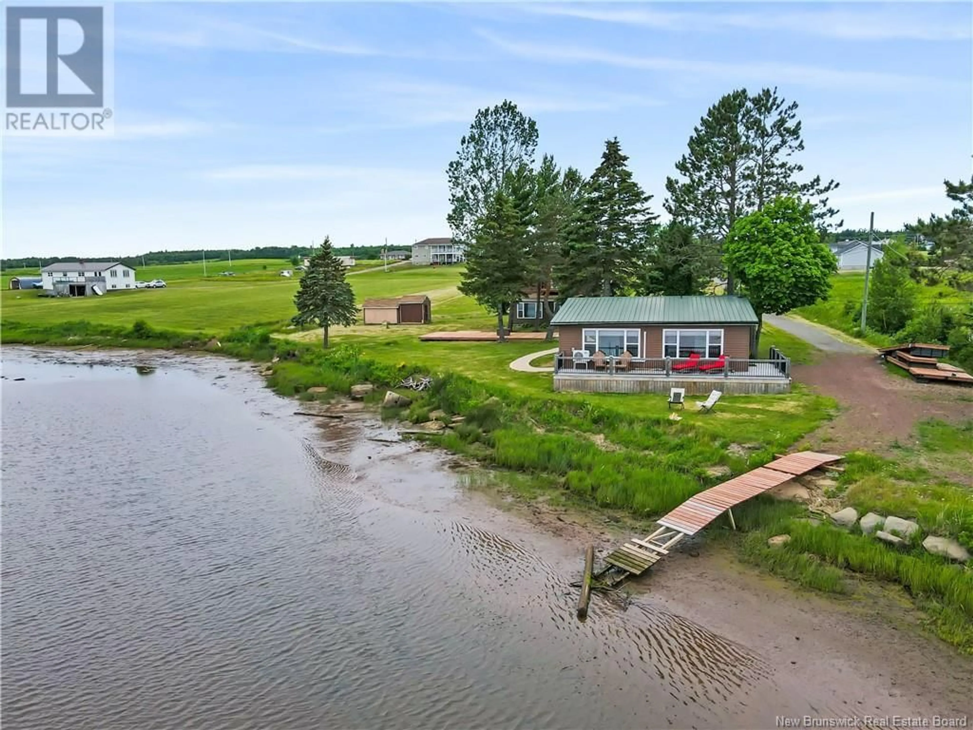 A pic from outside/outdoor area/front of a property/back of a property/a pic from drone, water/lake/river/ocean view for 2785 ROUTE 515, Sainte-Marie-De-Kent New Brunswick E4S2E7