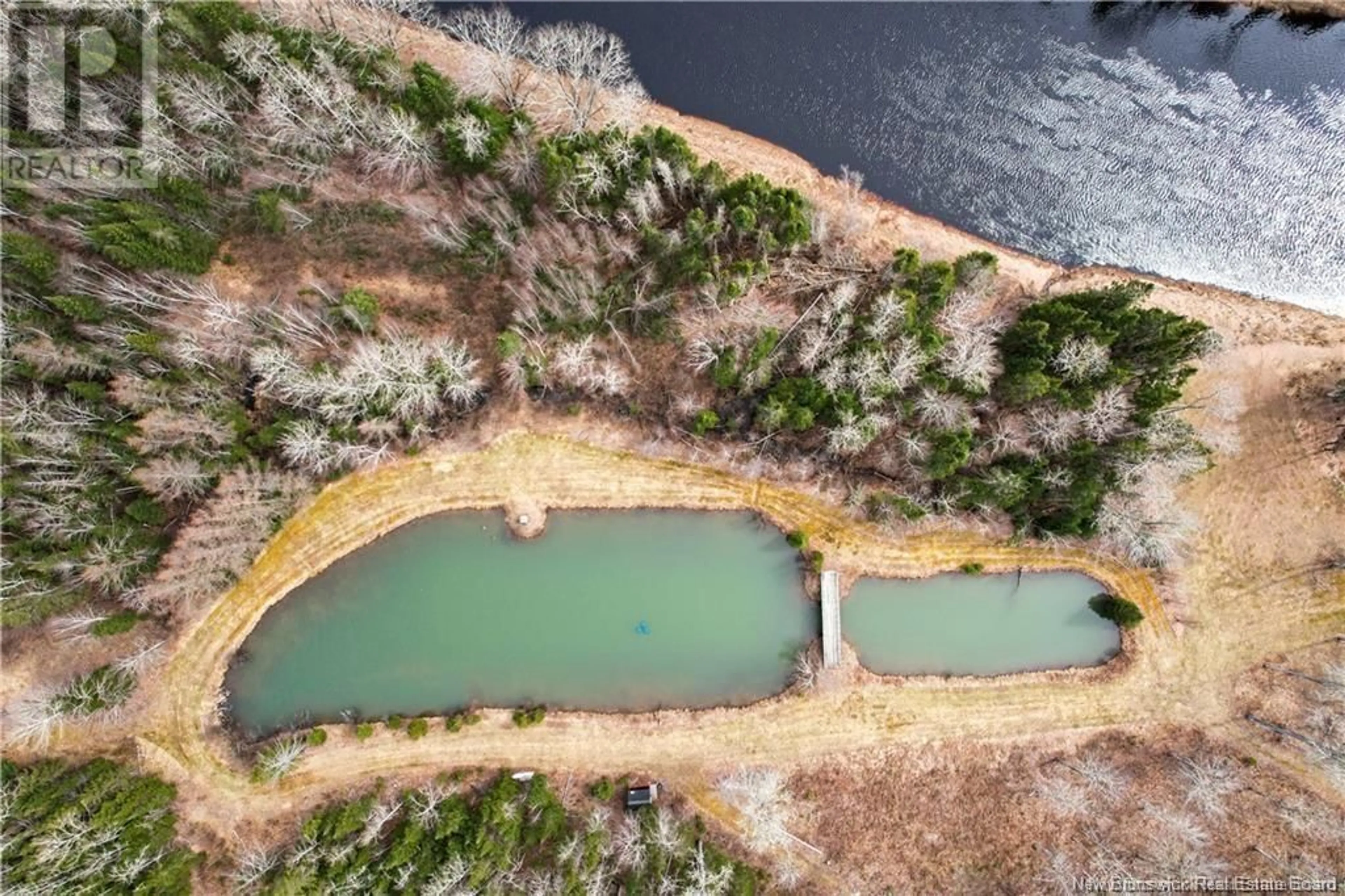 A pic from outside/outdoor area/front of a property/back of a property/a pic from drone, water/lake/river/ocean view for 8012 ROUTE 112, Brunswick Parish New Brunswick E4C4K3