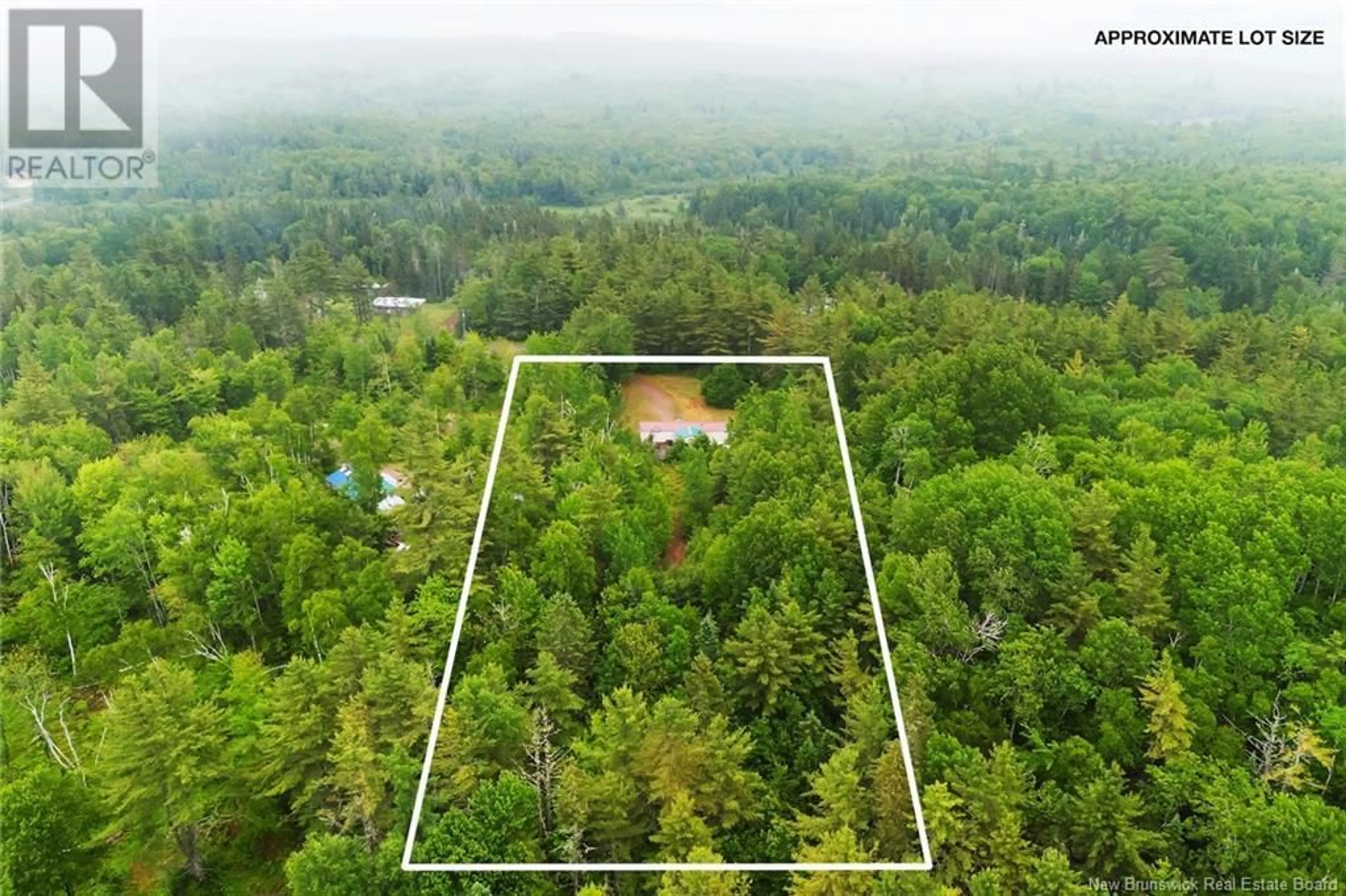 A pic from outside/outdoor area/front of a property/back of a property/a pic from drone, forest/trees view for 34 LAKE ROAD, South Oromocto Lake New Brunswick E5L2S8