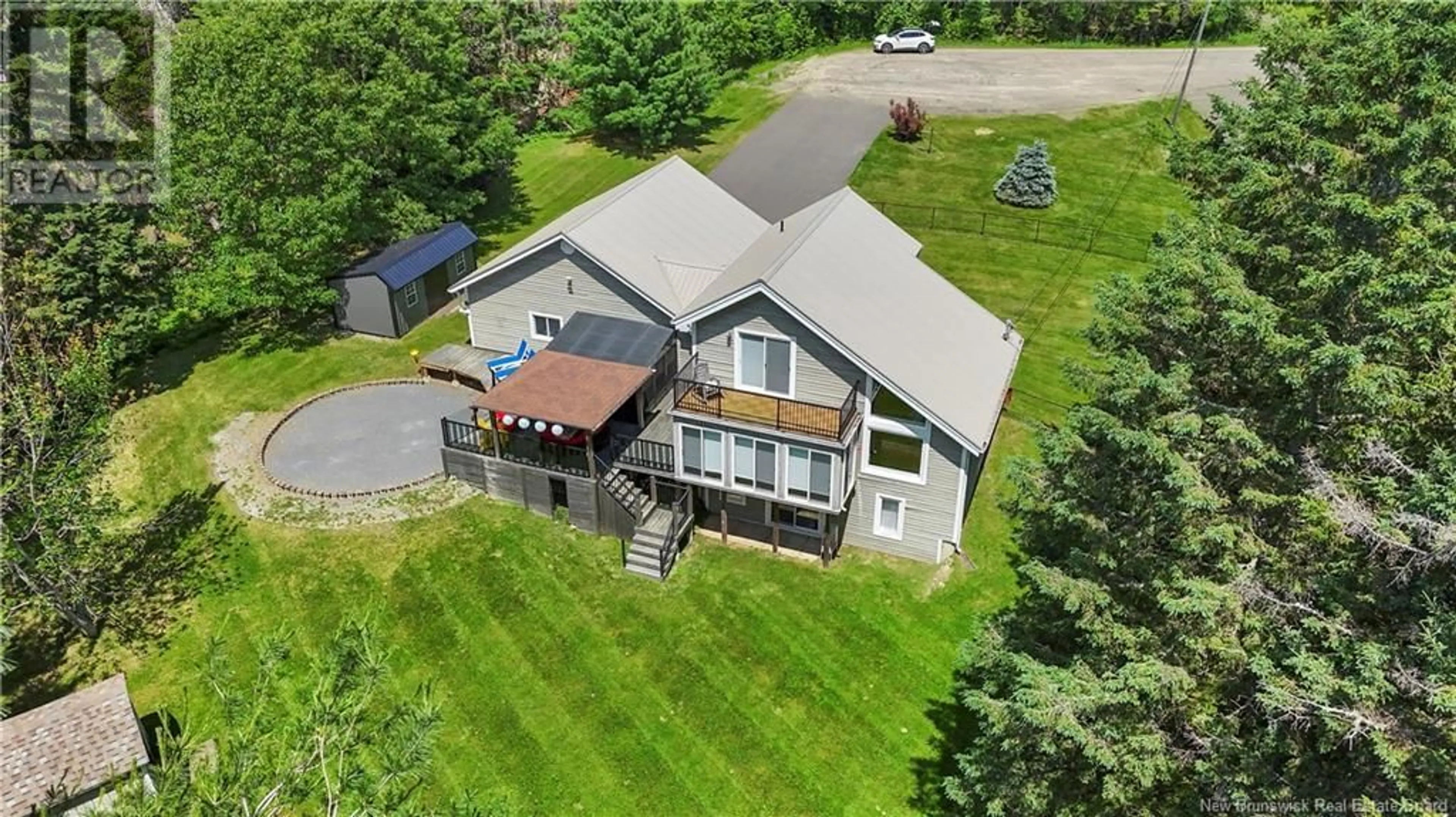 A pic from outside/outdoor area/front of a property/back of a property/a pic from drone, unknown for 25 BELLE DRIVE, Douglas New Brunswick E3G7Z6