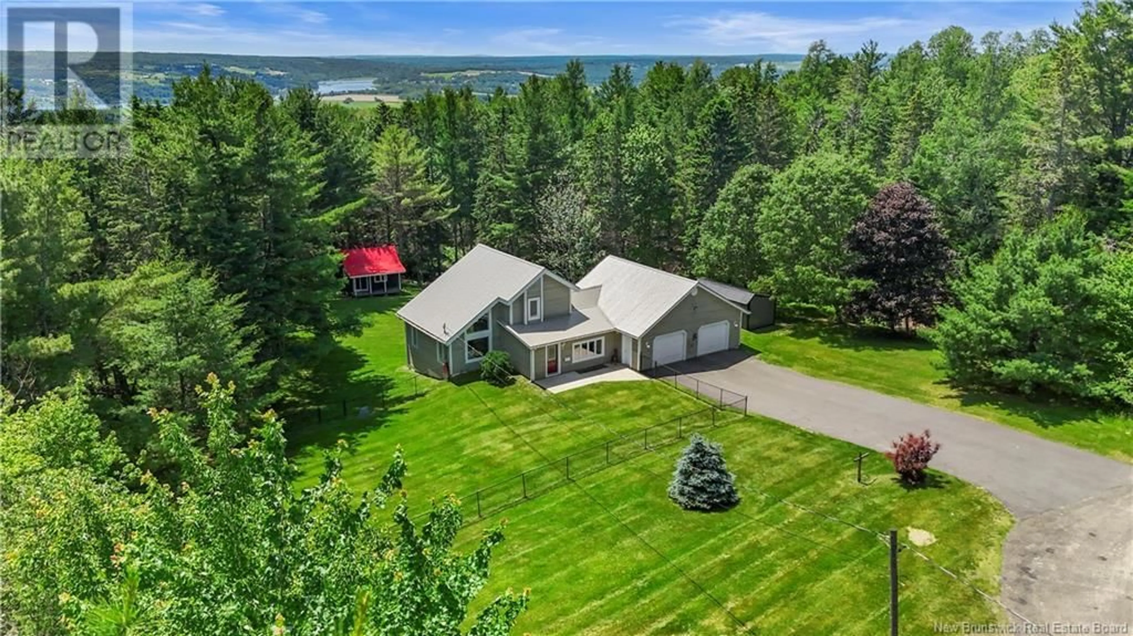 A pic from outside/outdoor area/front of a property/back of a property/a pic from drone, water/lake/river/ocean view for 25 BELLE DRIVE, Douglas New Brunswick E3G7Z6