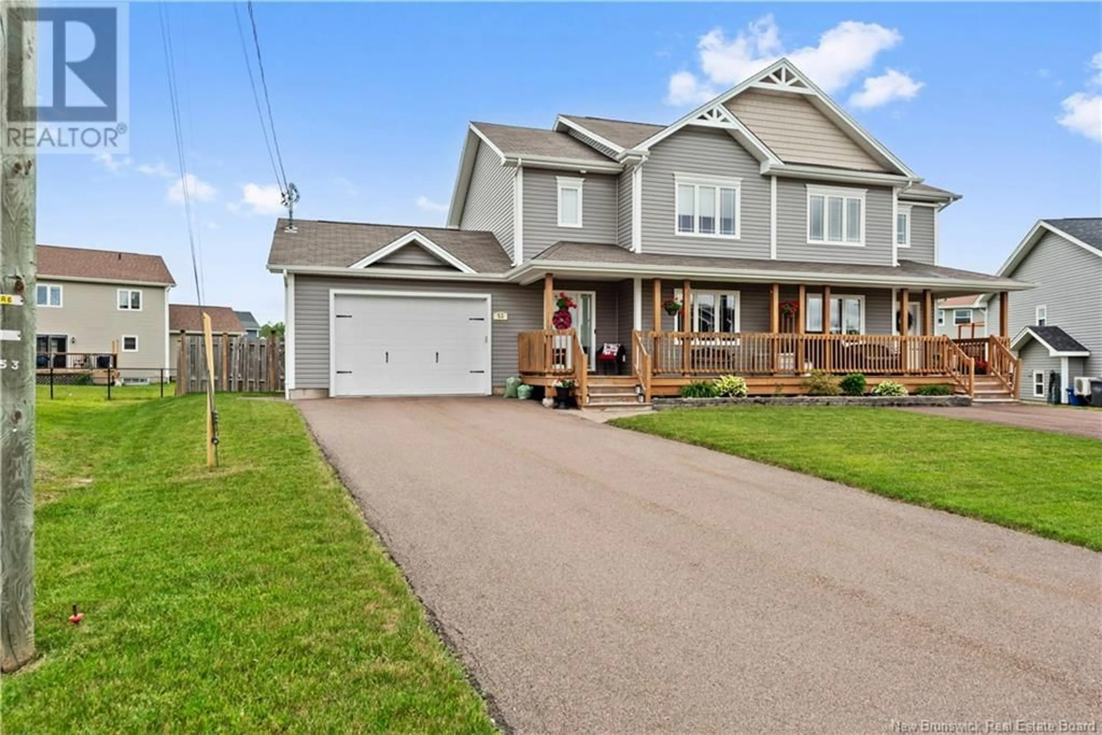 Home with vinyl exterior material, street for 53 GAMBIA STREET, Moncton New Brunswick E1G5S7
