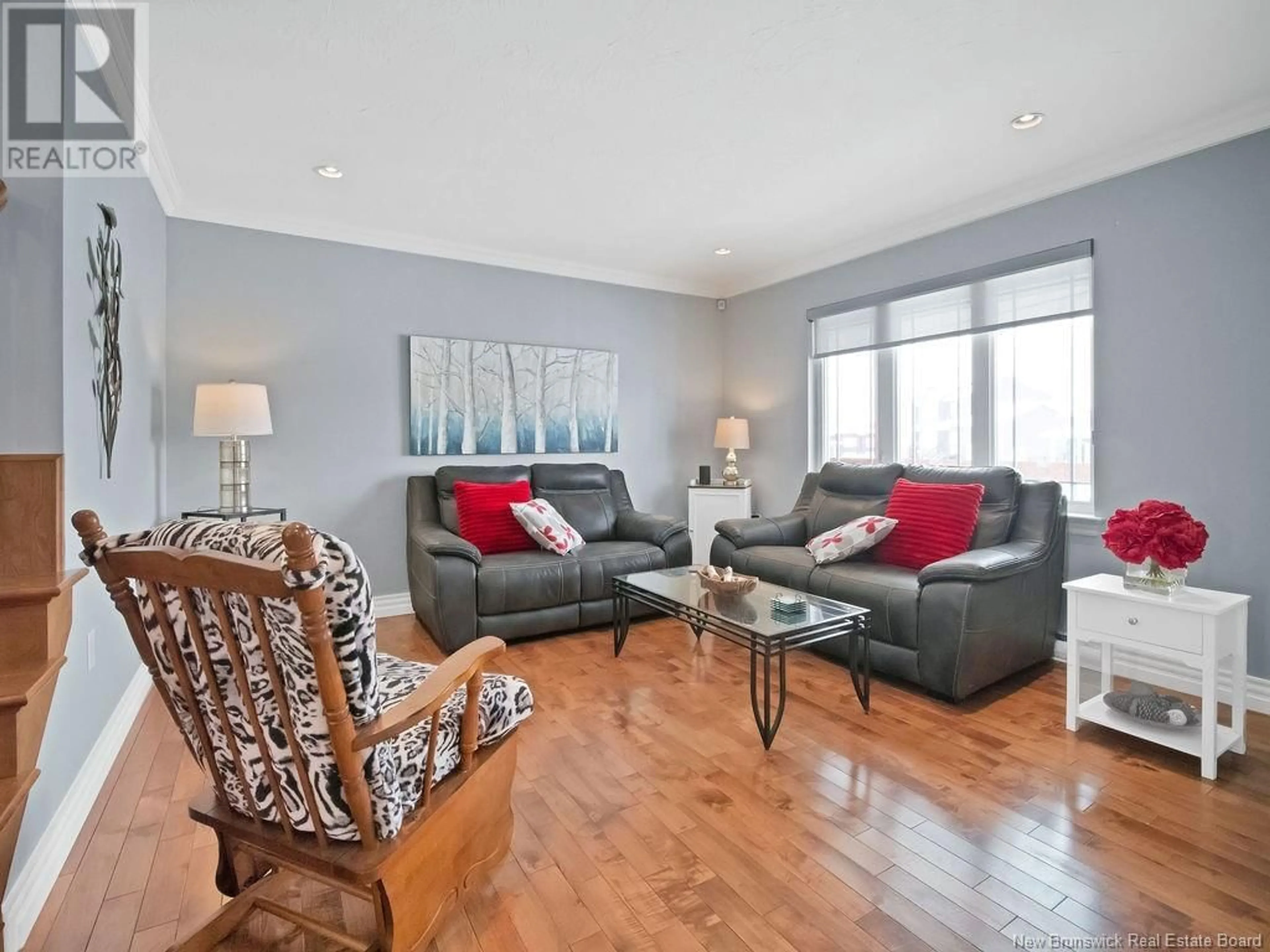 Living room with furniture, wood/laminate floor for 53 GAMBIA STREET, Moncton New Brunswick E1G5S7