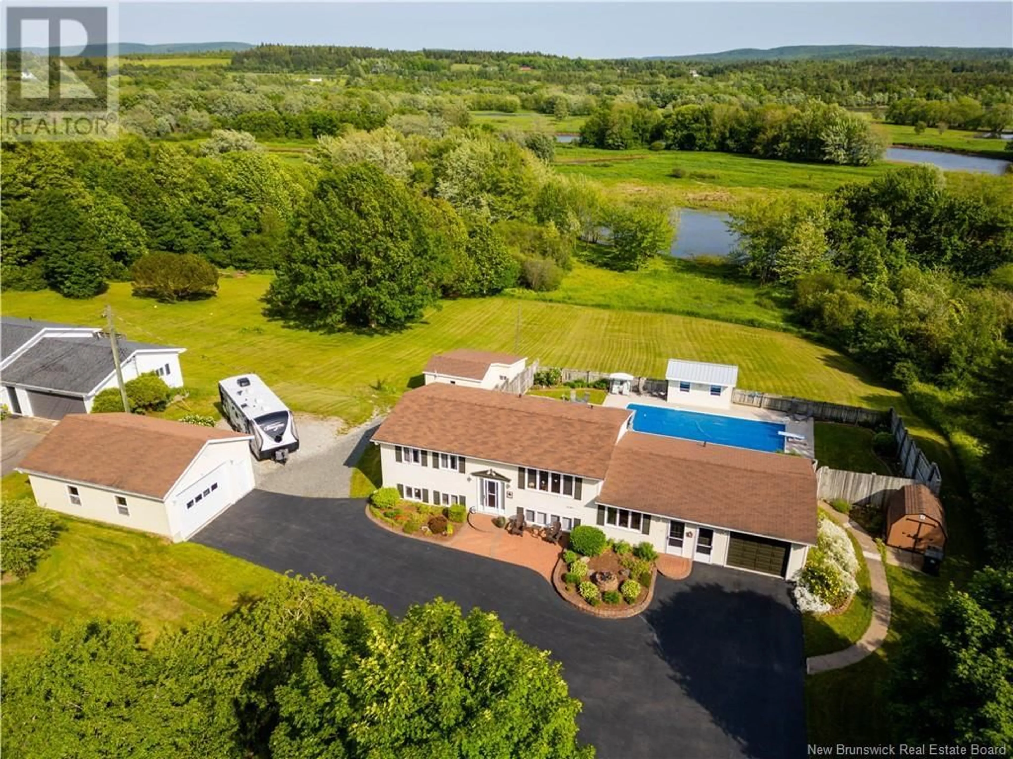 A pic from outside/outdoor area/front of a property/back of a property/a pic from drone, water/lake/river/ocean view for 1496 MAIN STREET, Hampton New Brunswick E5N6H1