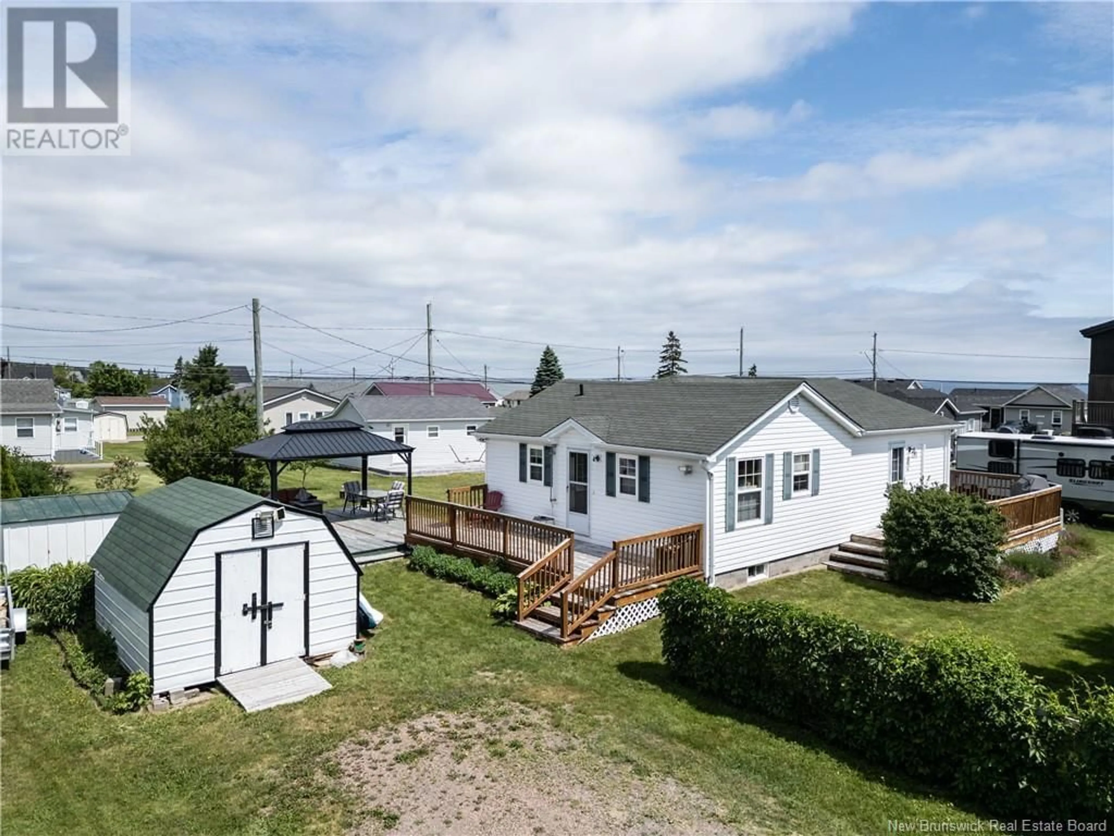 A pic from outside/outdoor area/front of a property/back of a property/a pic from drone, water/lake/river/ocean view for 20 LOBSTER LANE, Grande-Digue New Brunswick E4R4A7