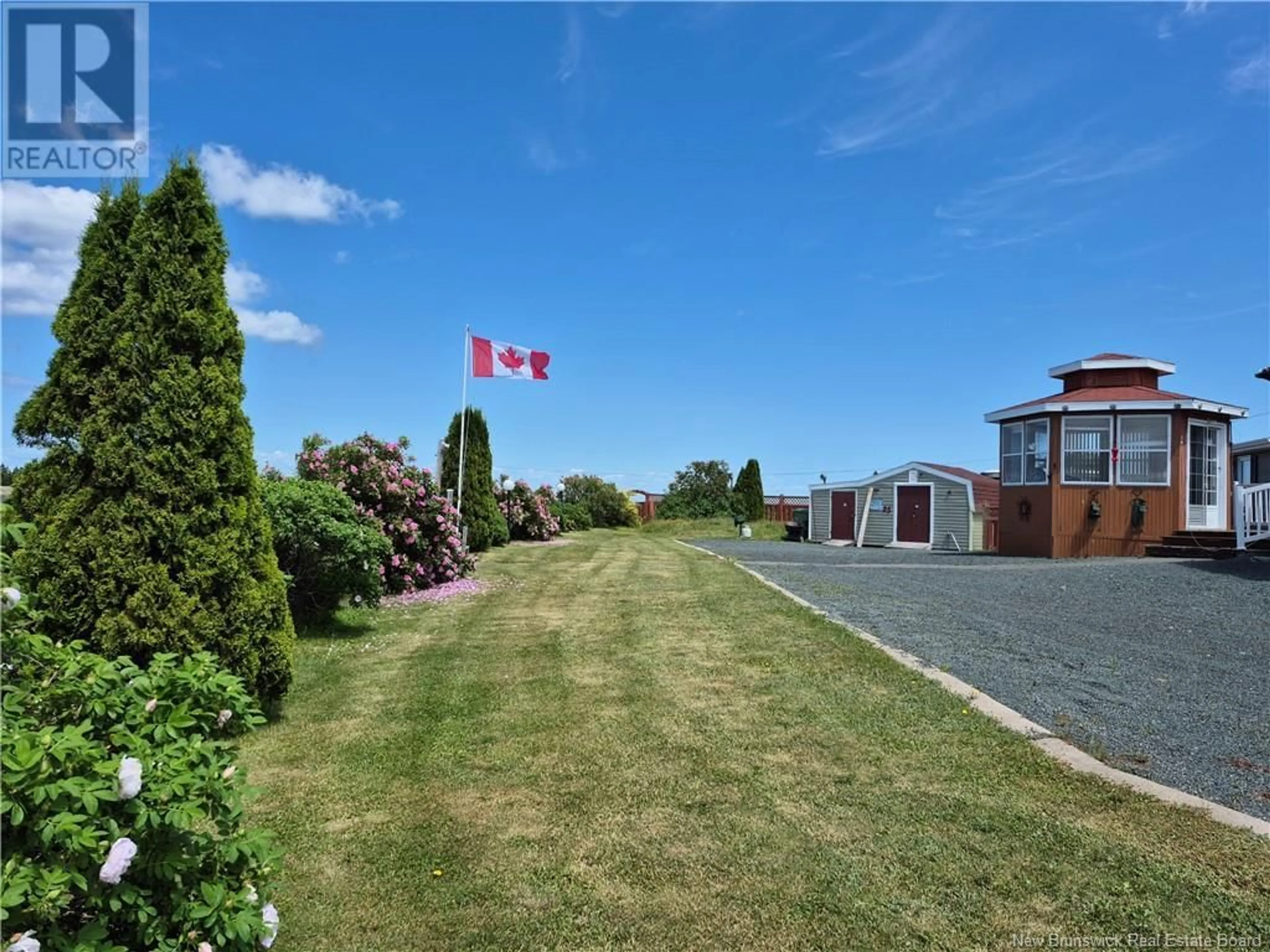 A pic from outside/outdoor area/front of a property/back of a property/a pic from drone, unknown for 25 BAYSHORE DRIVE, Bathurst New Brunswick E2A6A5