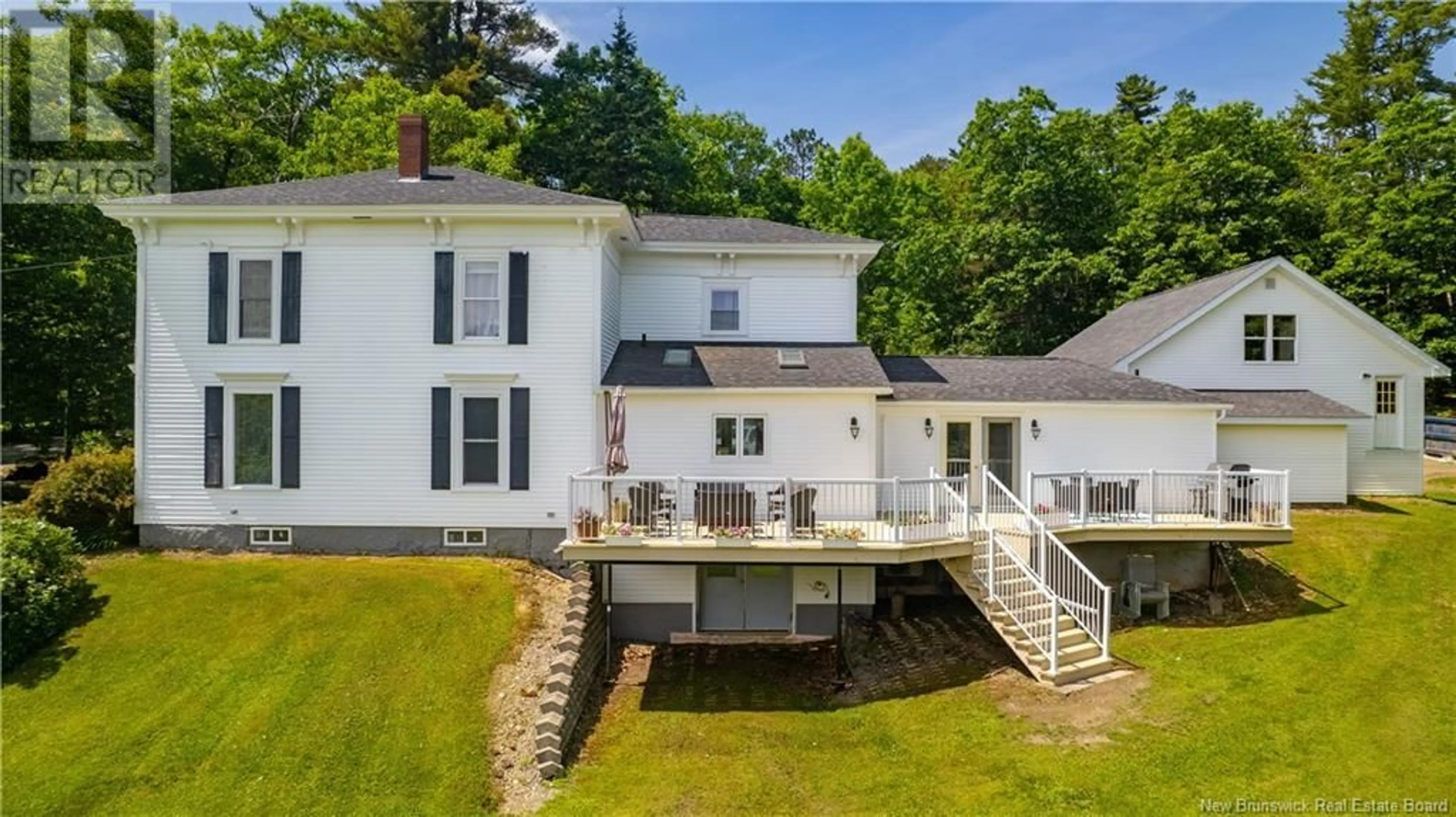 A pic from outside/outdoor area/front of a property/back of a property/a pic from drone, water/lake/river/ocean view for 129 PLEASANT, St. Stephen New Brunswick E3L1B4