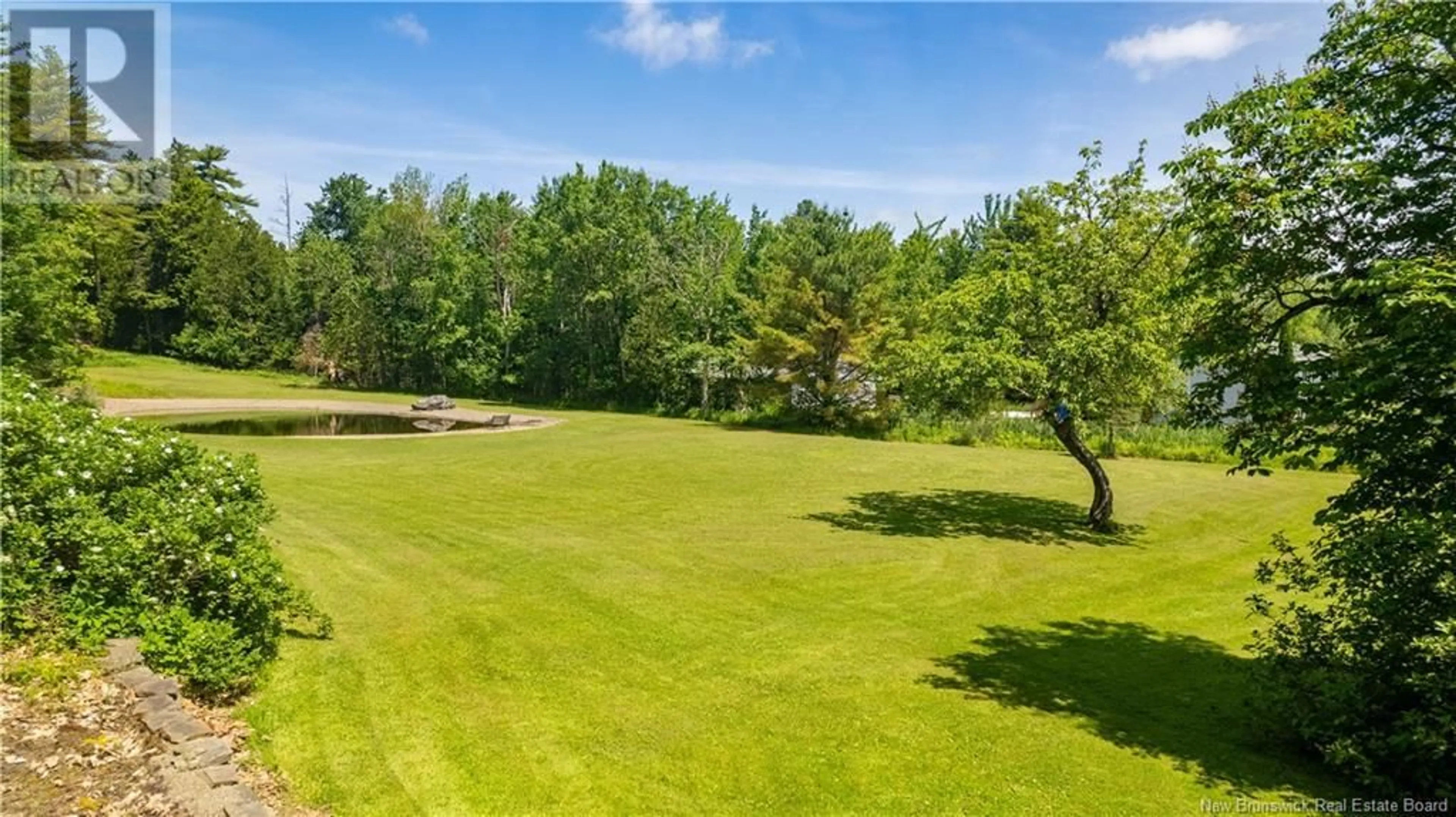 A pic from outside/outdoor area/front of a property/back of a property/a pic from drone, forest/trees view for 129 PLEASANT, St. Stephen New Brunswick E3L1B4