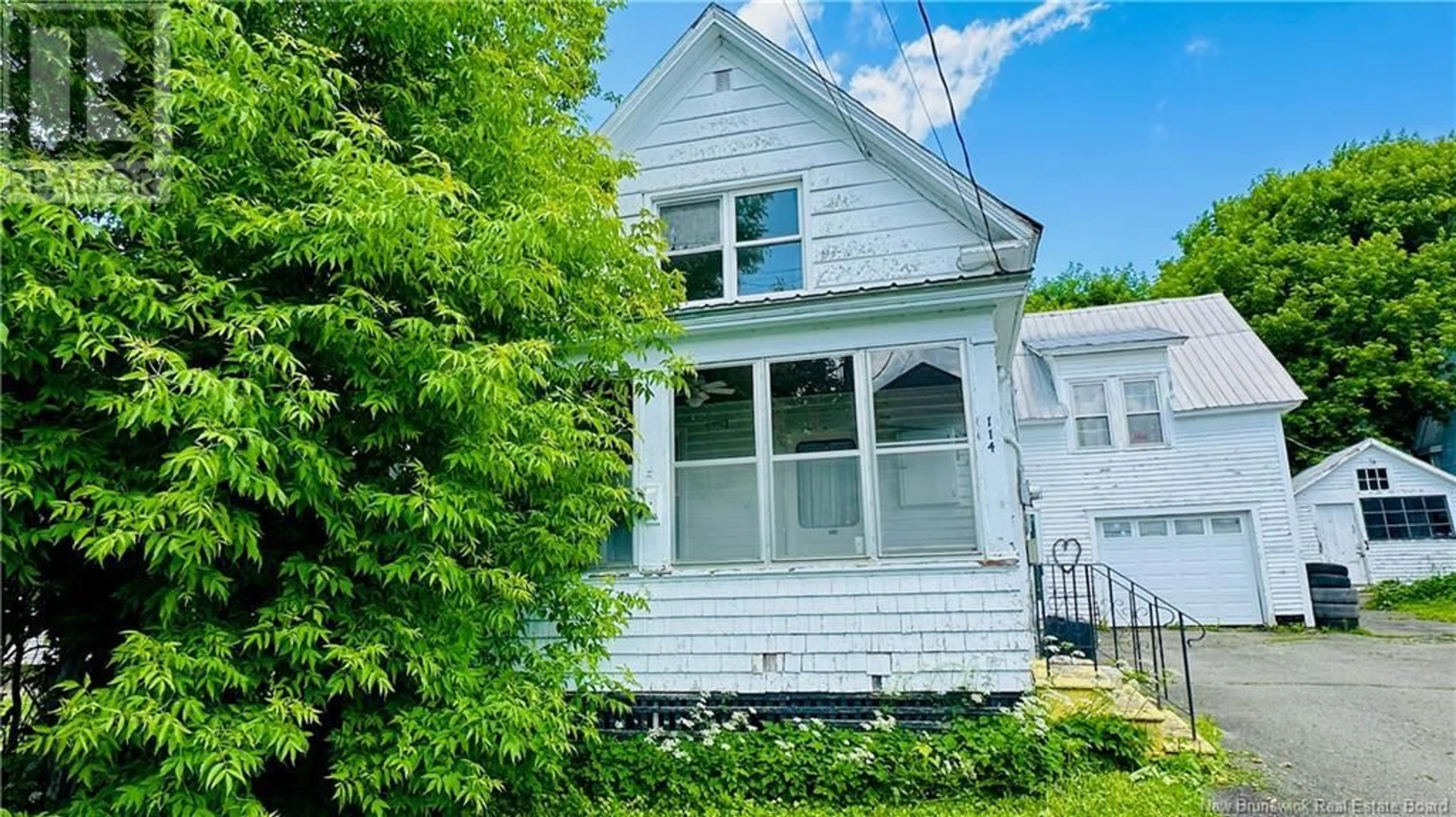 Home with vinyl exterior material, street for 114 MAPLE STREET, Woodstock New Brunswick E7M2H4