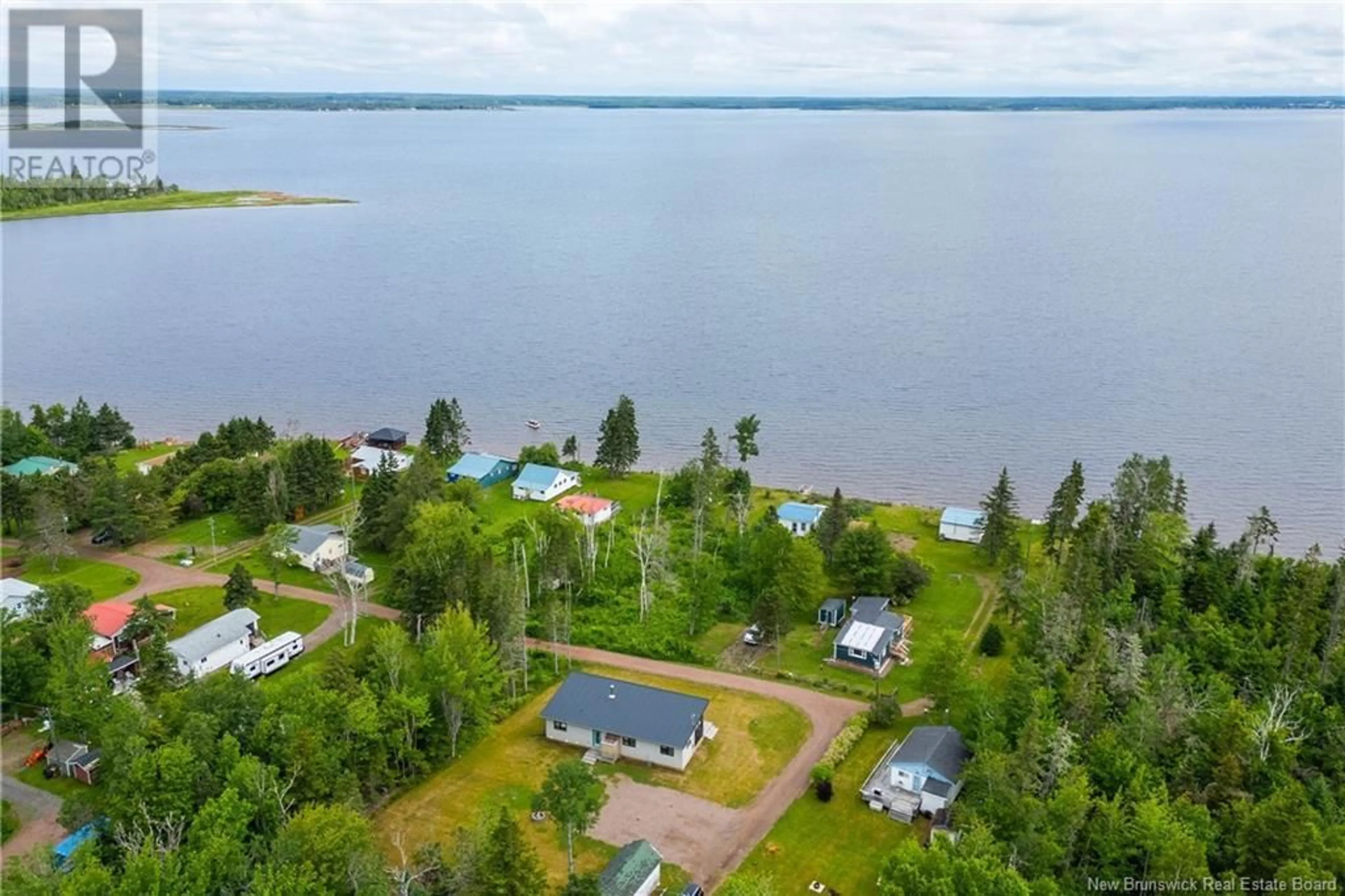 A pic from outside/outdoor area/front of a property/back of a property/a pic from drone, water/lake/river/ocean view for 6 WOOD'S BEACH LANE, Baie Verte New Brunswick E4M1N1