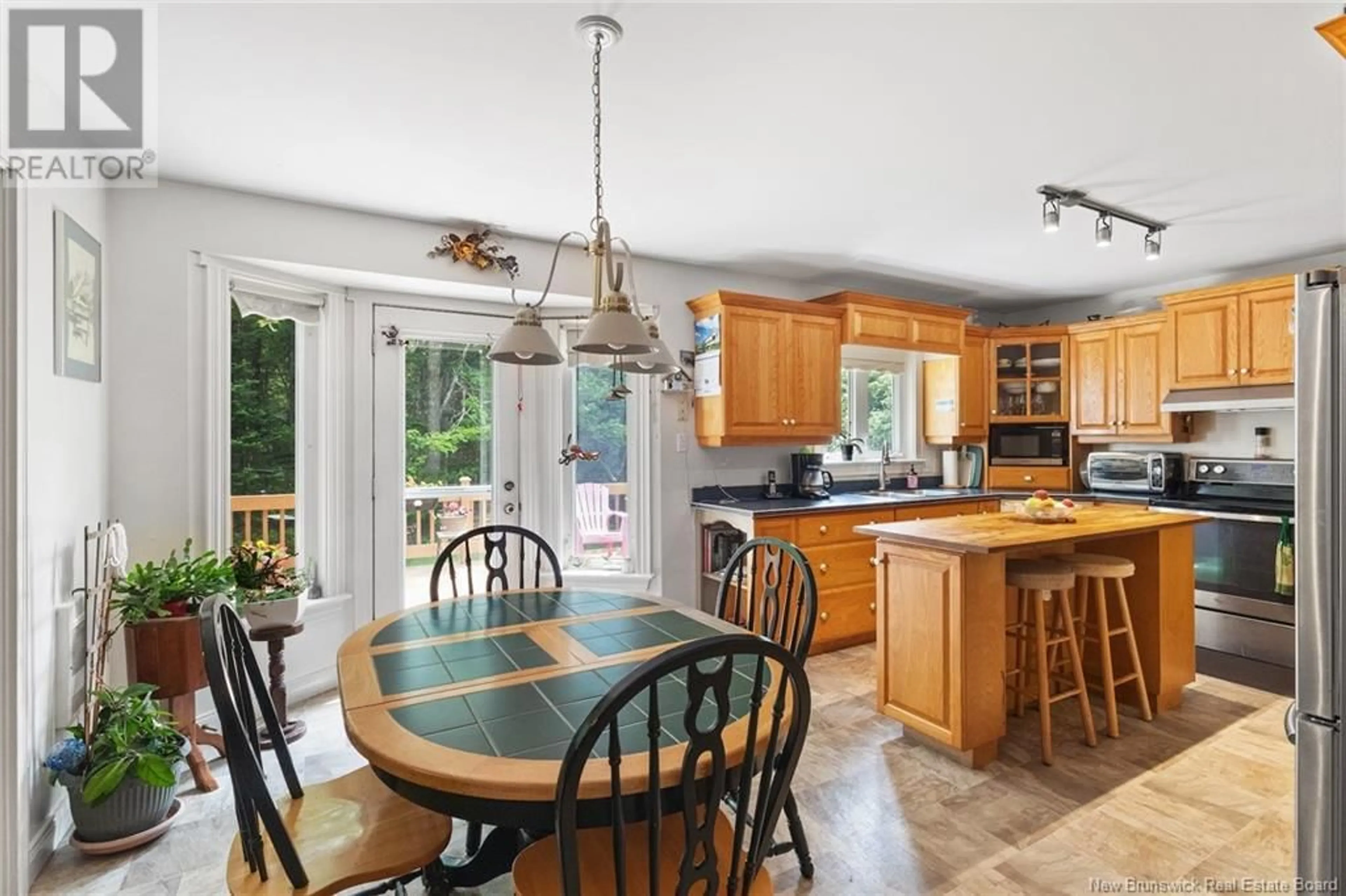 Open concept kitchen, ceramic/tile floor for 41 TUCANA DRIVE, Hanwell New Brunswick E3C1M9
